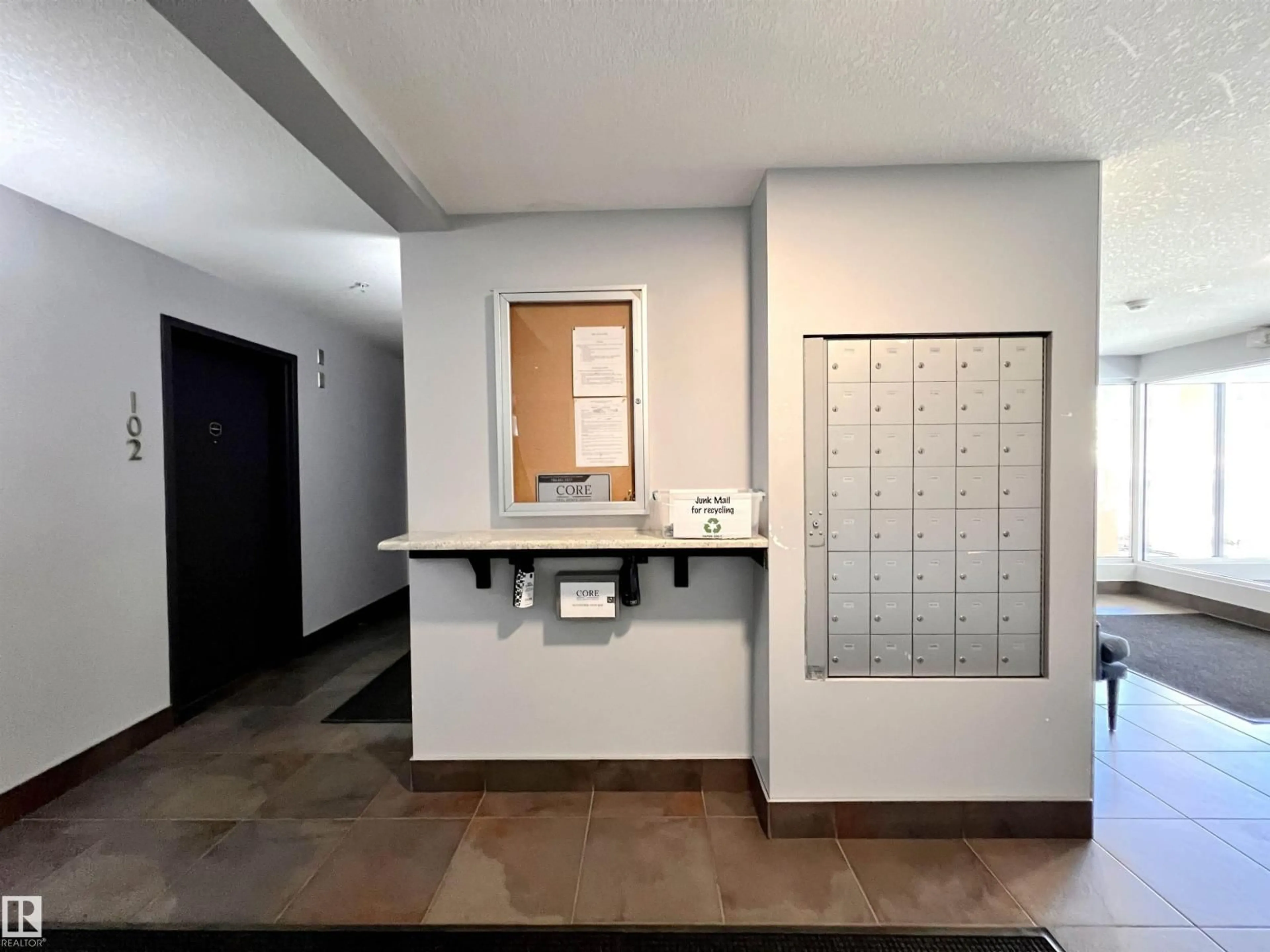 Indoor foyer for #205 - 11203 103A AV, Edmonton Alberta T5K2E4
