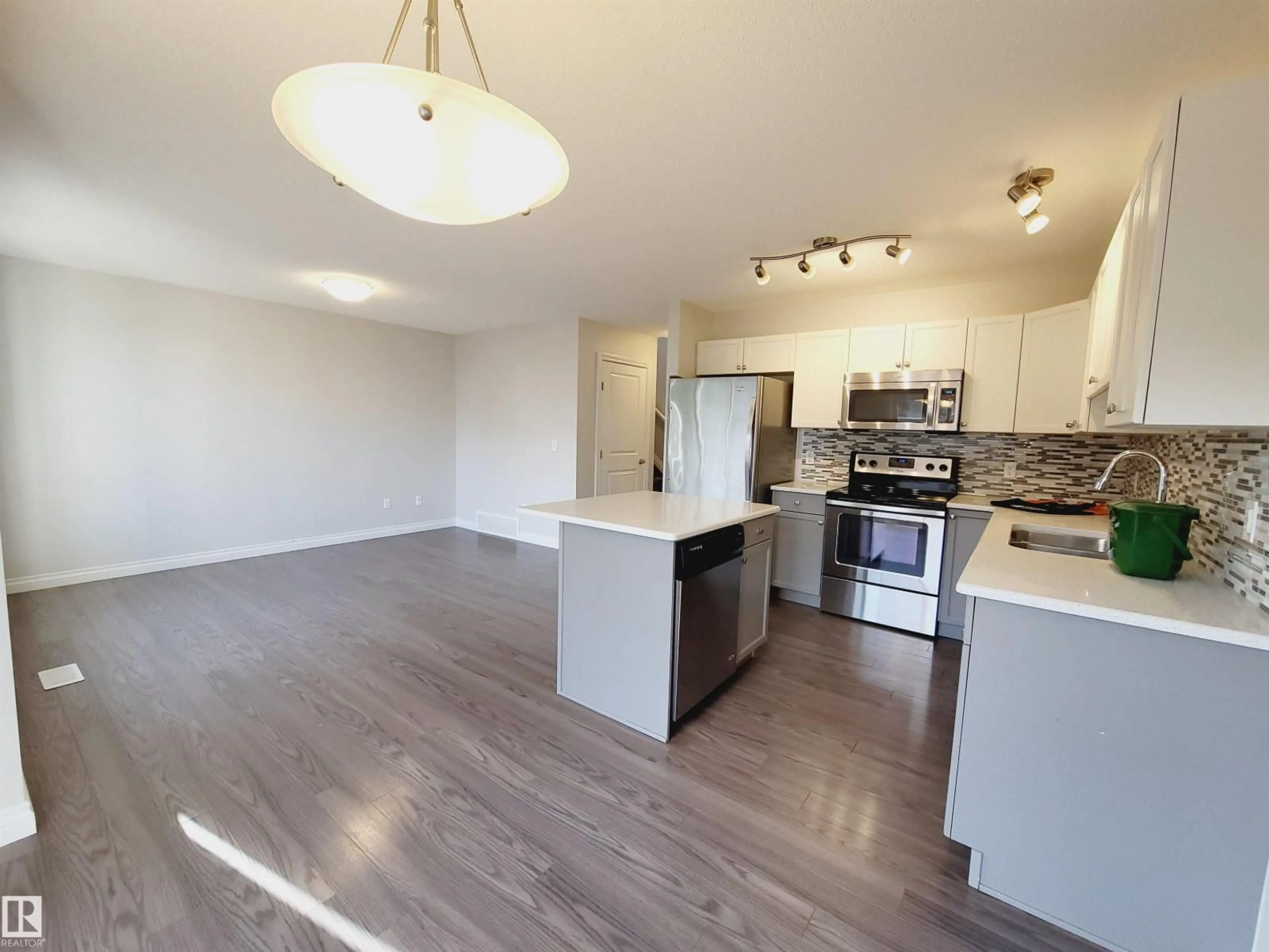 Open concept kitchen, wood/laminate floor for 25 - 445 BRINTNELL BV, Edmonton Alberta T5Y0V5