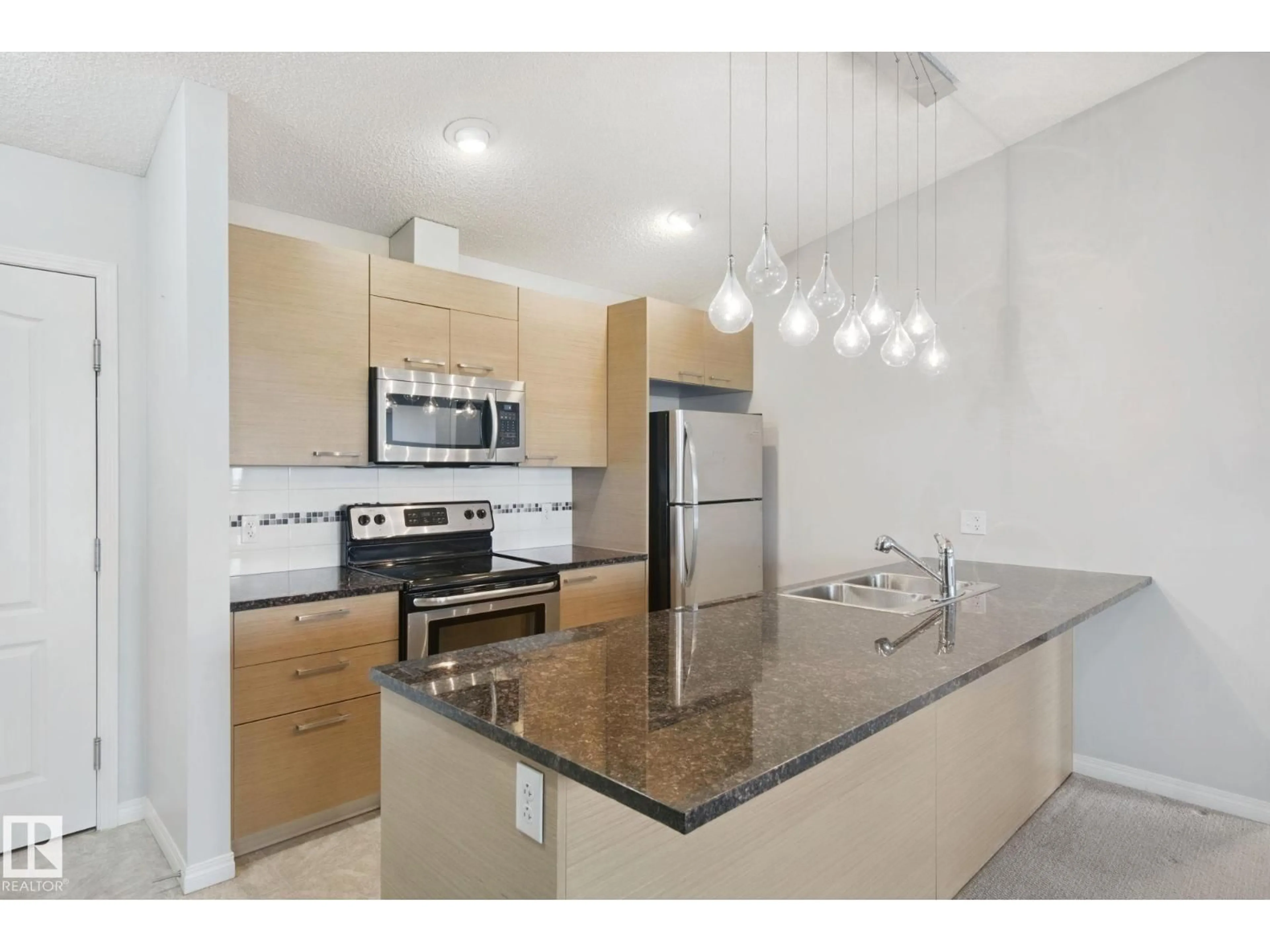 Standard kitchen, ceramic/tile floor for 9351 - 3415 SIMPSON DR, Edmonton Alberta T6R0N4