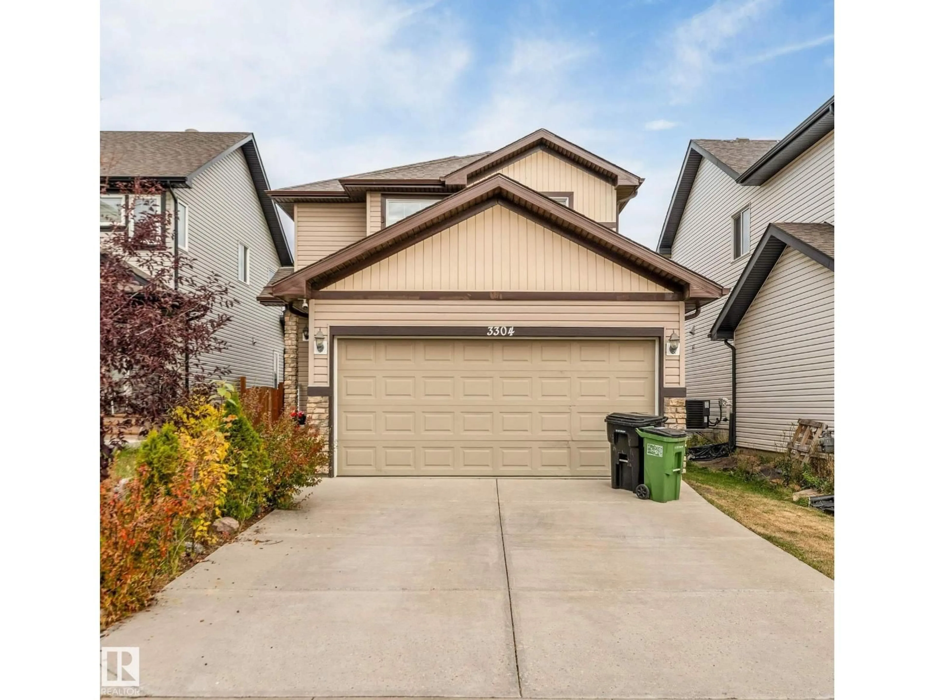 Home with vinyl exterior material, street for 3304 13 AV, Edmonton Alberta T6T0Z4