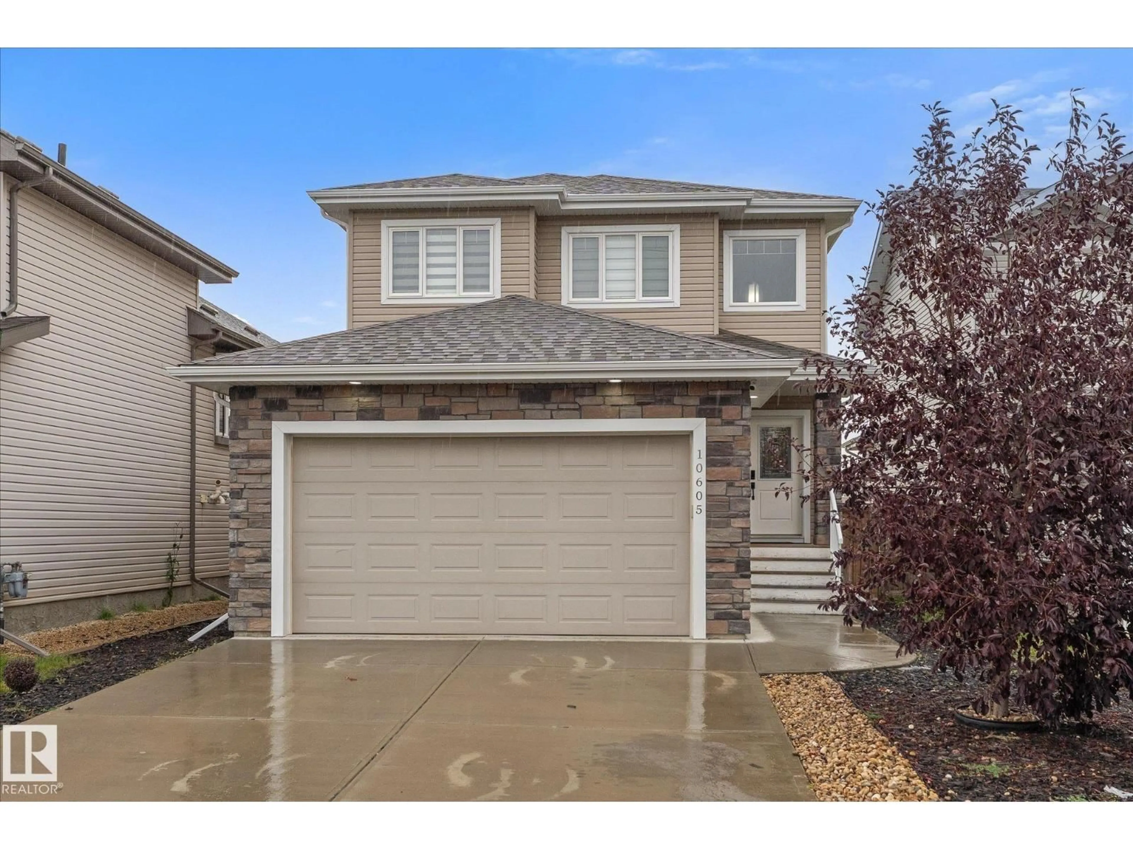 Home with vinyl exterior material, street for 10605 96 ST, Morinville Alberta T8R2N5