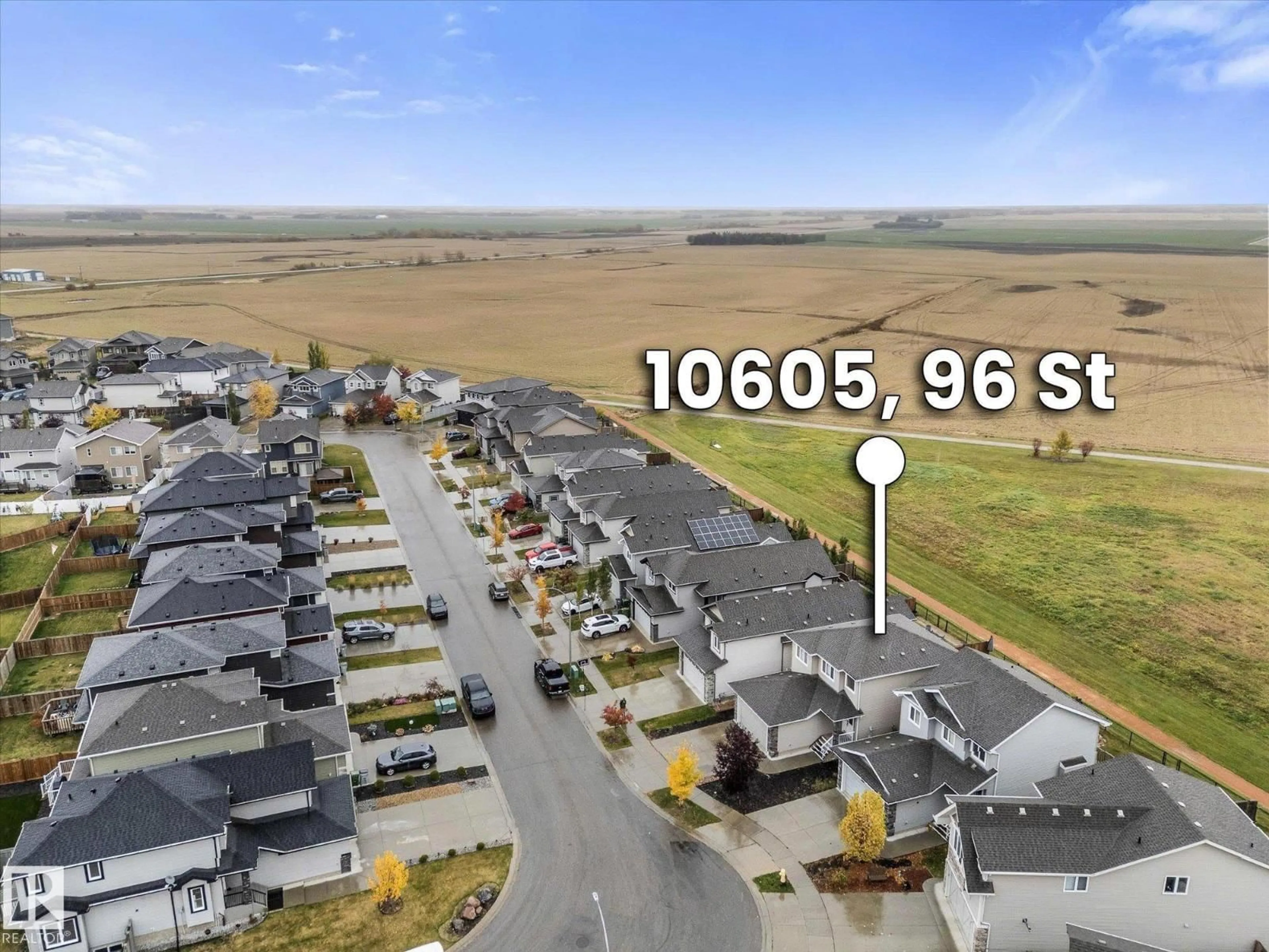 A pic from outside/outdoor area/front of a property/back of a property/a pic from drone, street for 10605 96 ST, Morinville Alberta T8R2N5