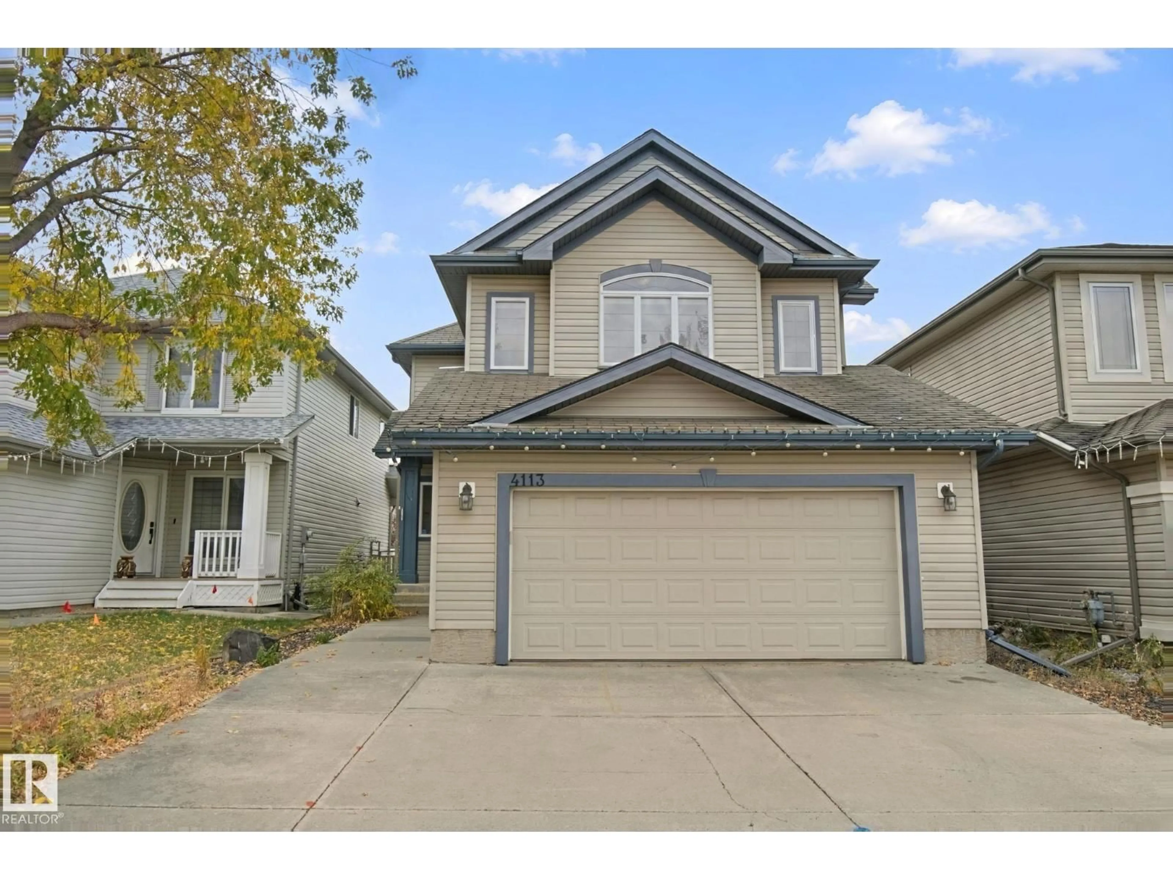 Home with vinyl exterior material, street for 4113 158 AV, Edmonton Alberta T5Y0A3