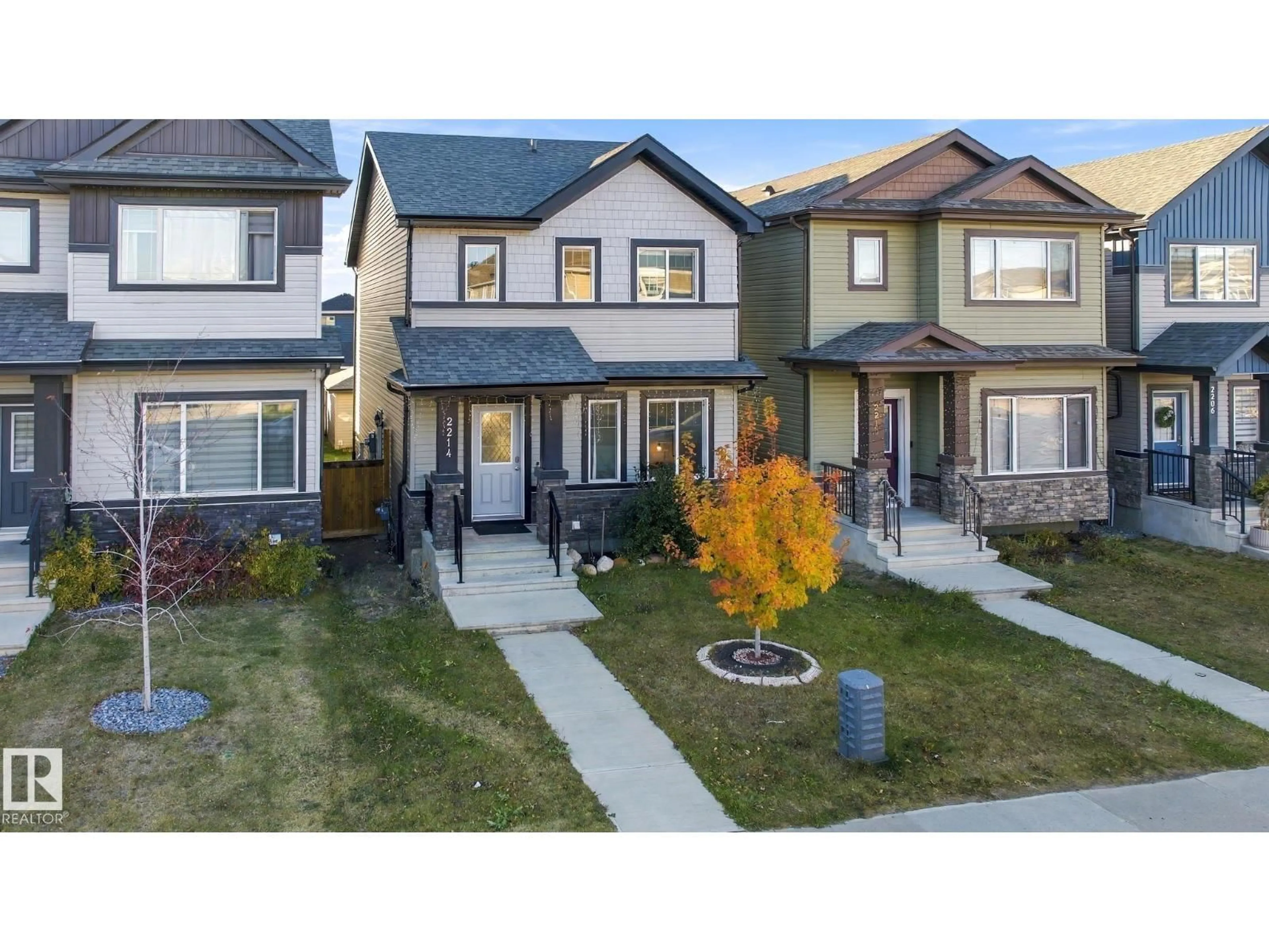 Home with vinyl exterior material, street for 2214 54 ST, Edmonton Alberta T6X2X7