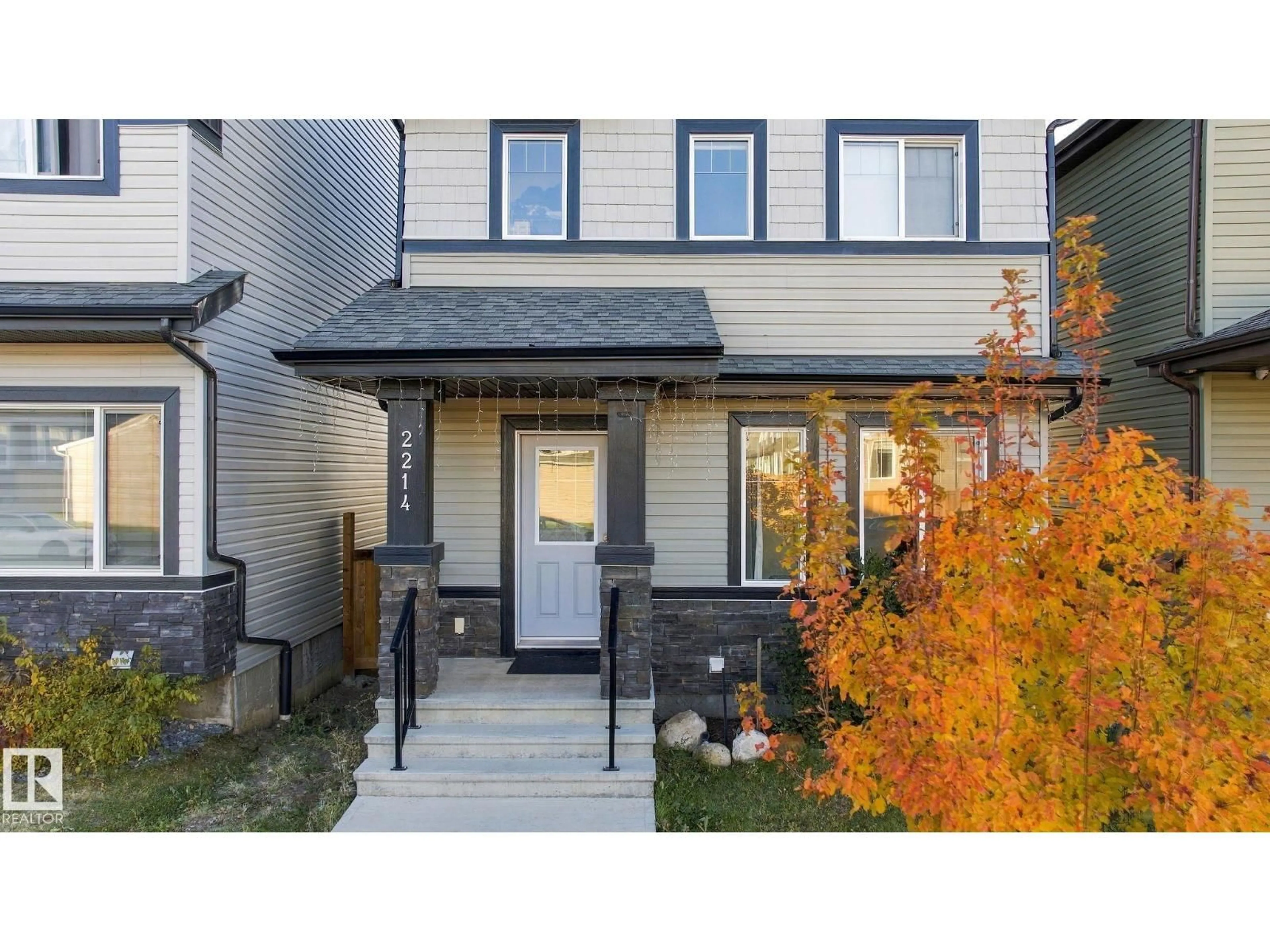 Home with vinyl exterior material, street for 2214 54 ST, Edmonton Alberta T6X2X7
