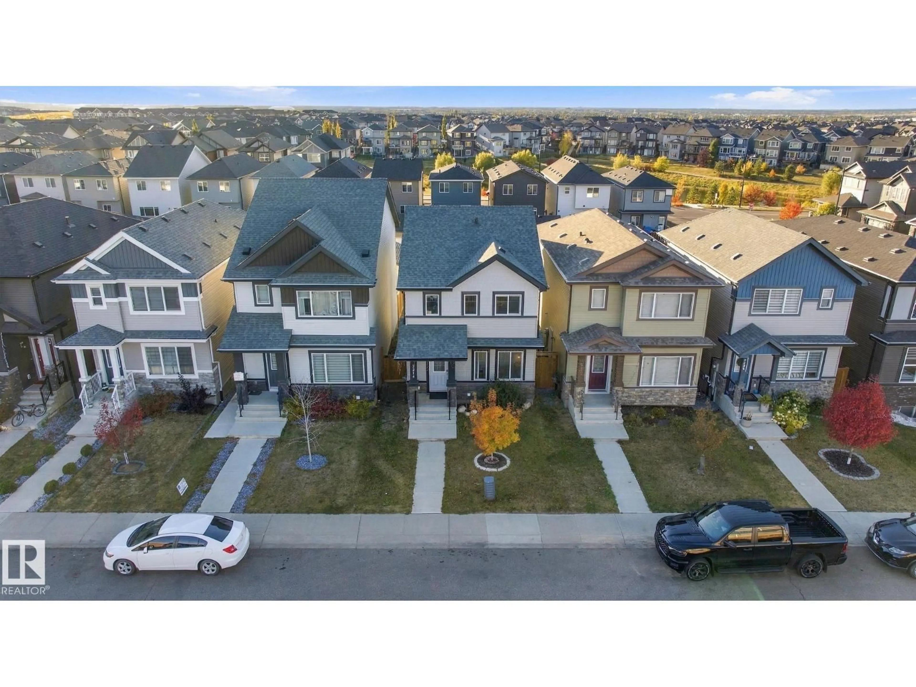 A pic from outside/outdoor area/front of a property/back of a property/a pic from drone, street for 2214 54 ST, Edmonton Alberta T6X2X7