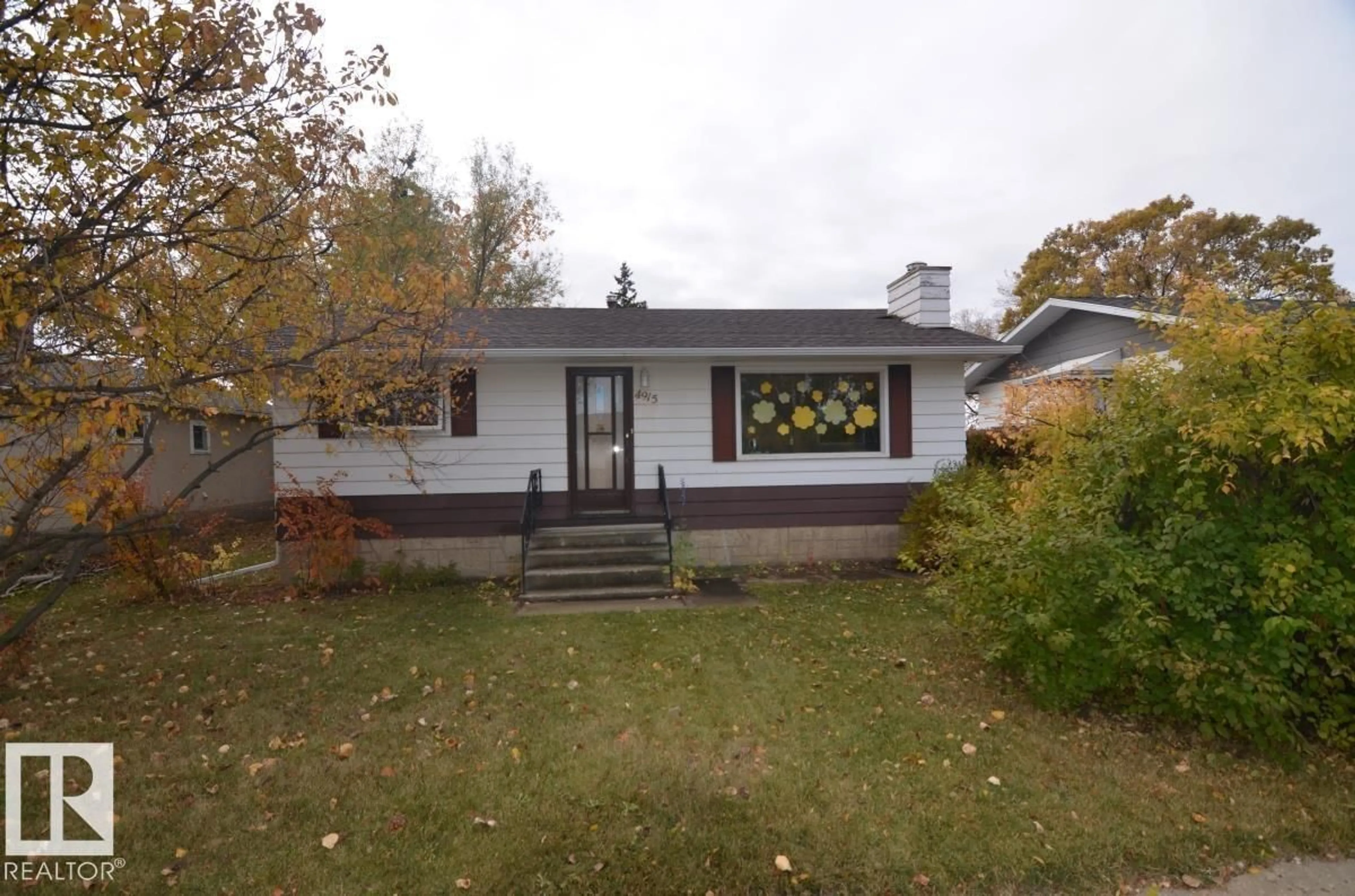 Home with vinyl exterior material, street for 4915 53 AV, Tofield Alberta T0B4J0