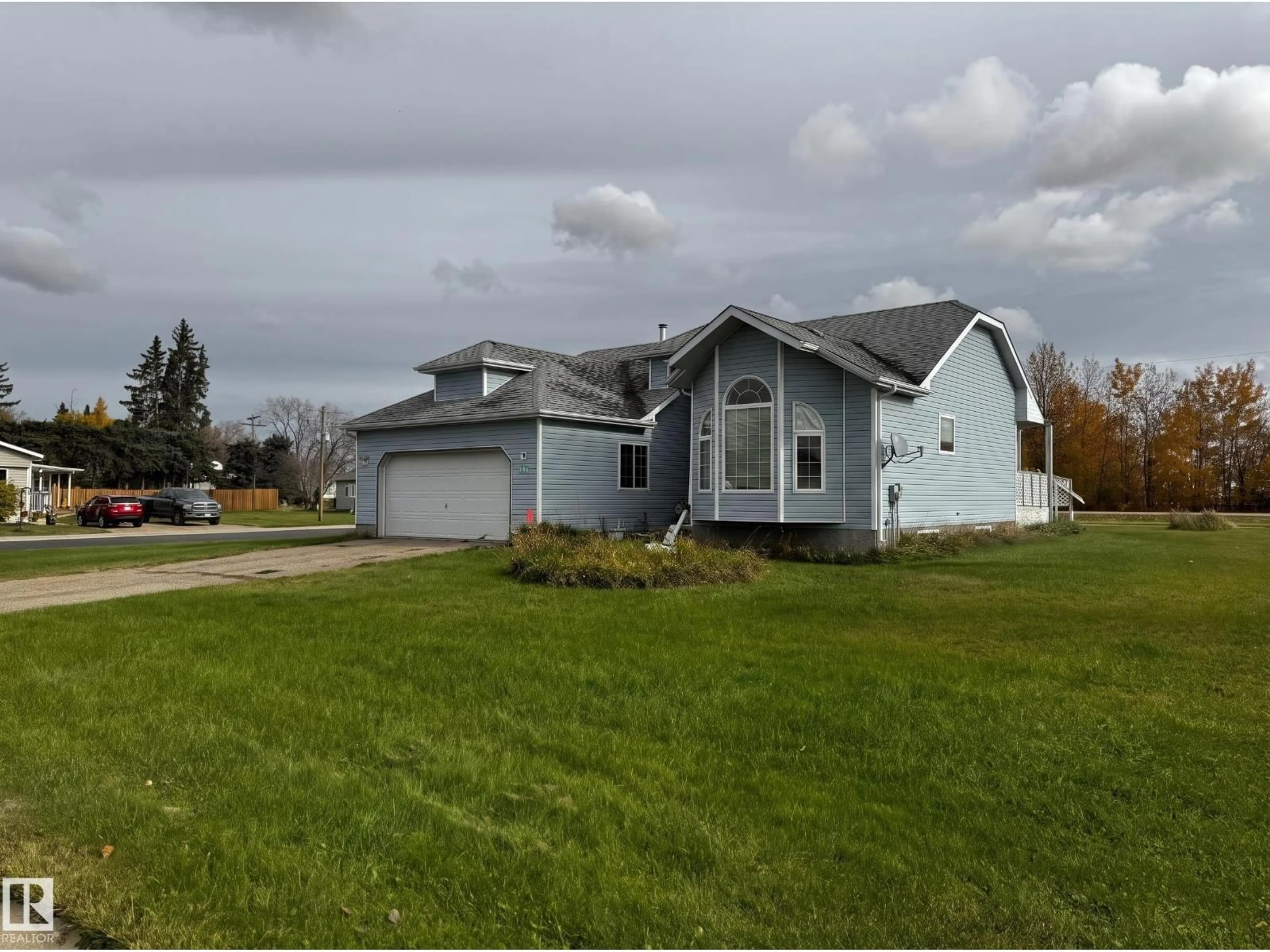 Home with vinyl exterior material, street for 4751 49A ST, Vimy Alberta T0G2J0