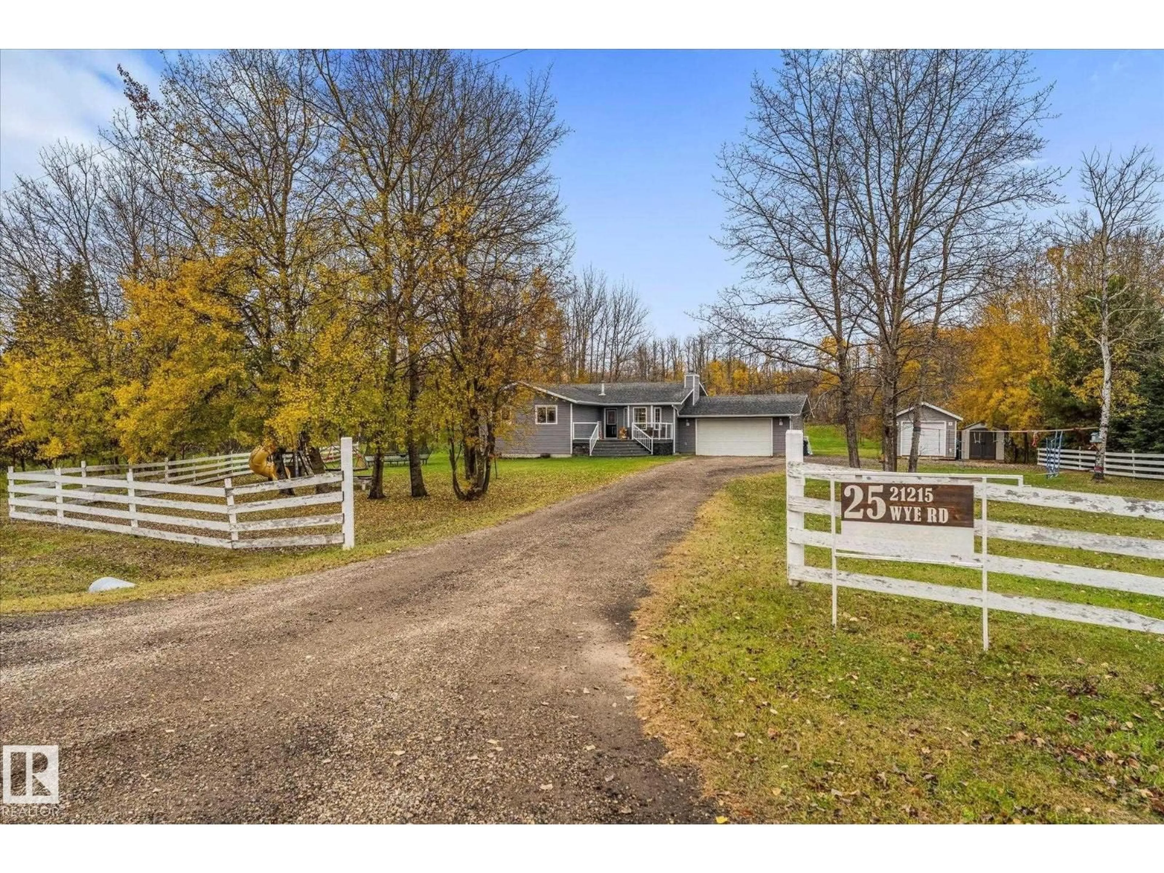 A pic from outside/outdoor area/front of a property/back of a property/a pic from drone, street for 21215 - 25 WYE RD, Rural Strathcona County Alberta T8L1C8