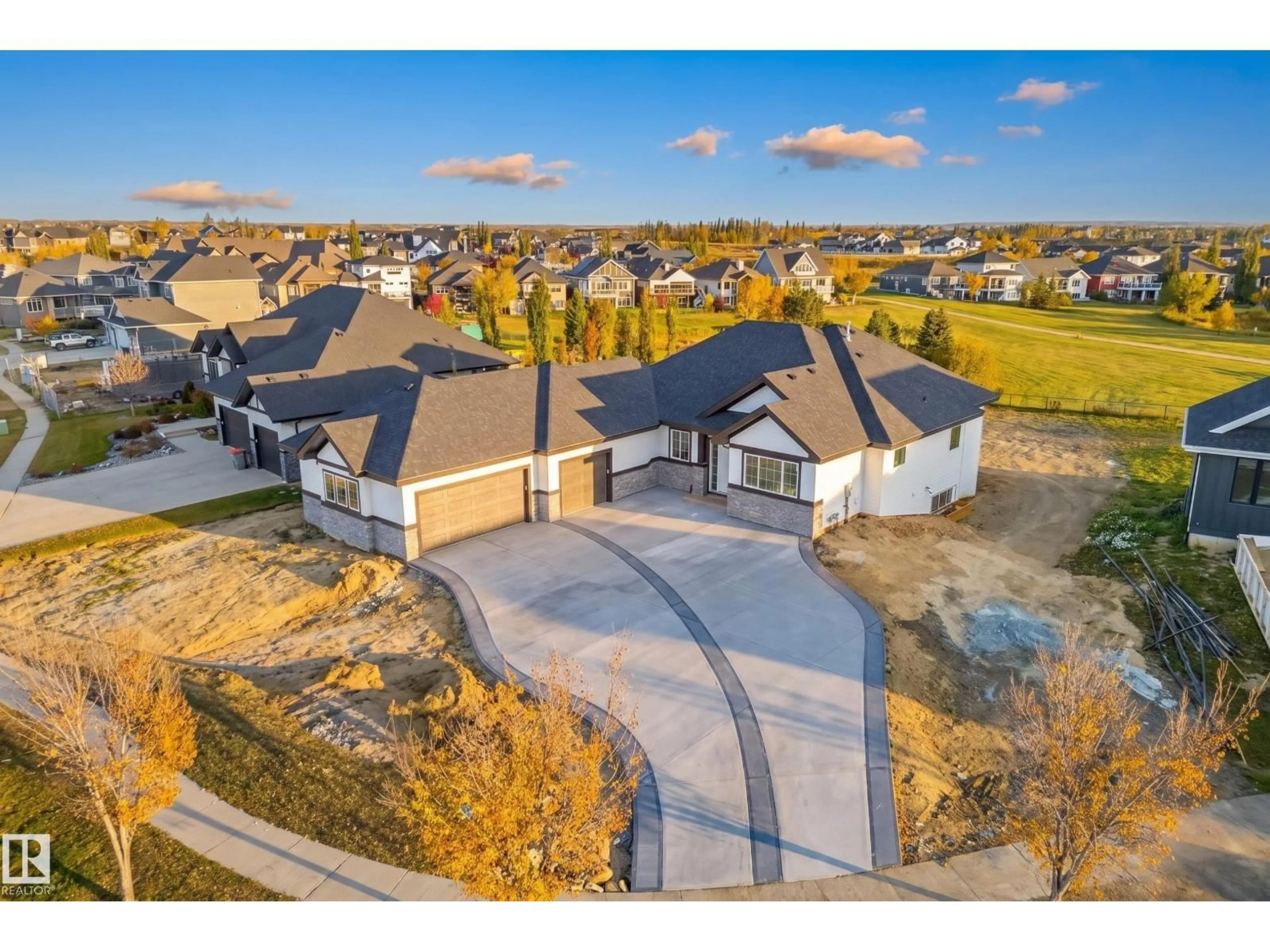 A pic from outside/outdoor area/front of a property/back of a property/a pic from drone, street for 1050 GENESIS LAKE BV, Stony Plain Alberta T7Z0G3
