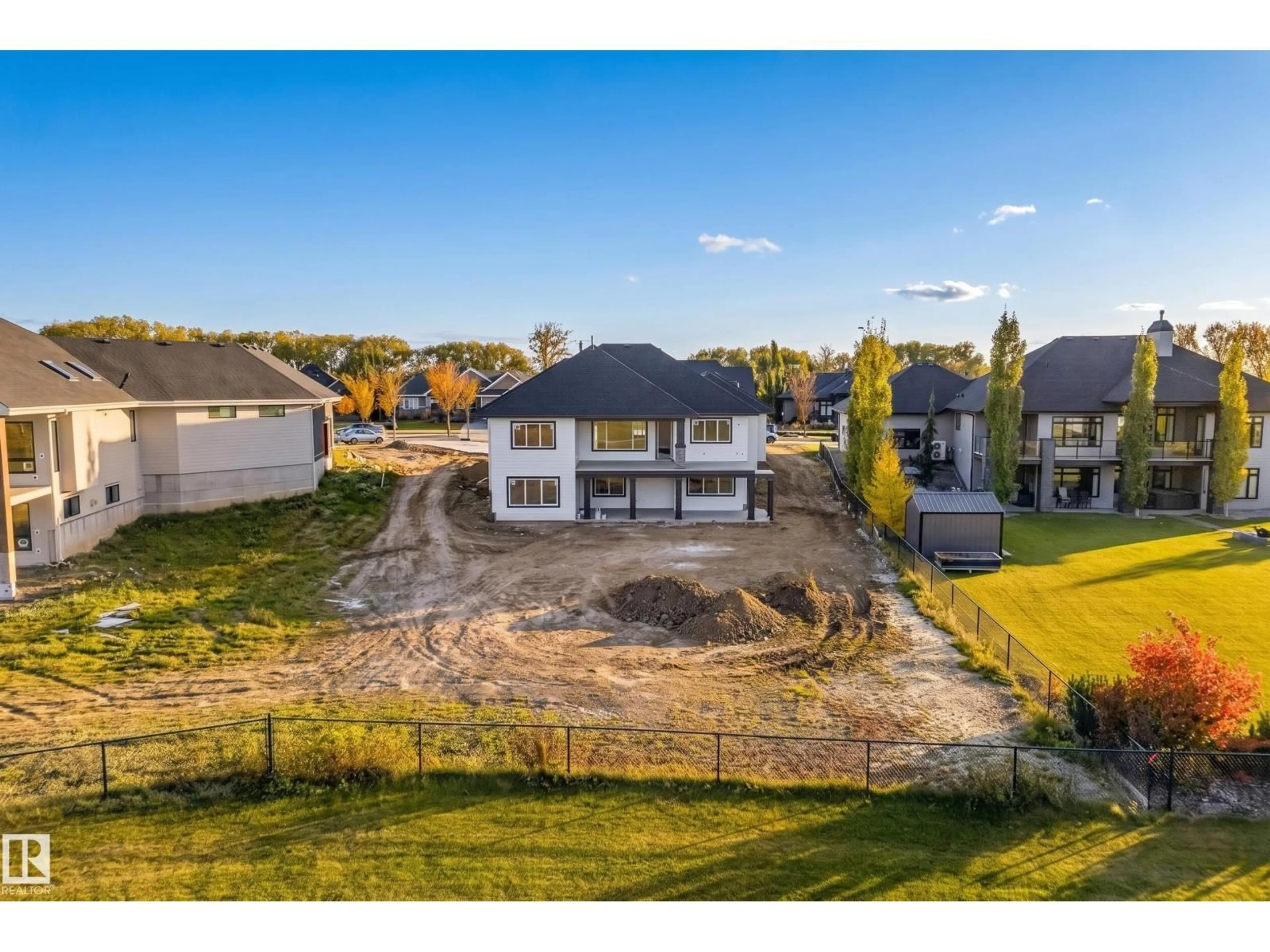 A pic from outside/outdoor area/front of a property/back of a property/a pic from drone, unknown for 1050 GENESIS LAKE BV, Stony Plain Alberta T7Z0G3