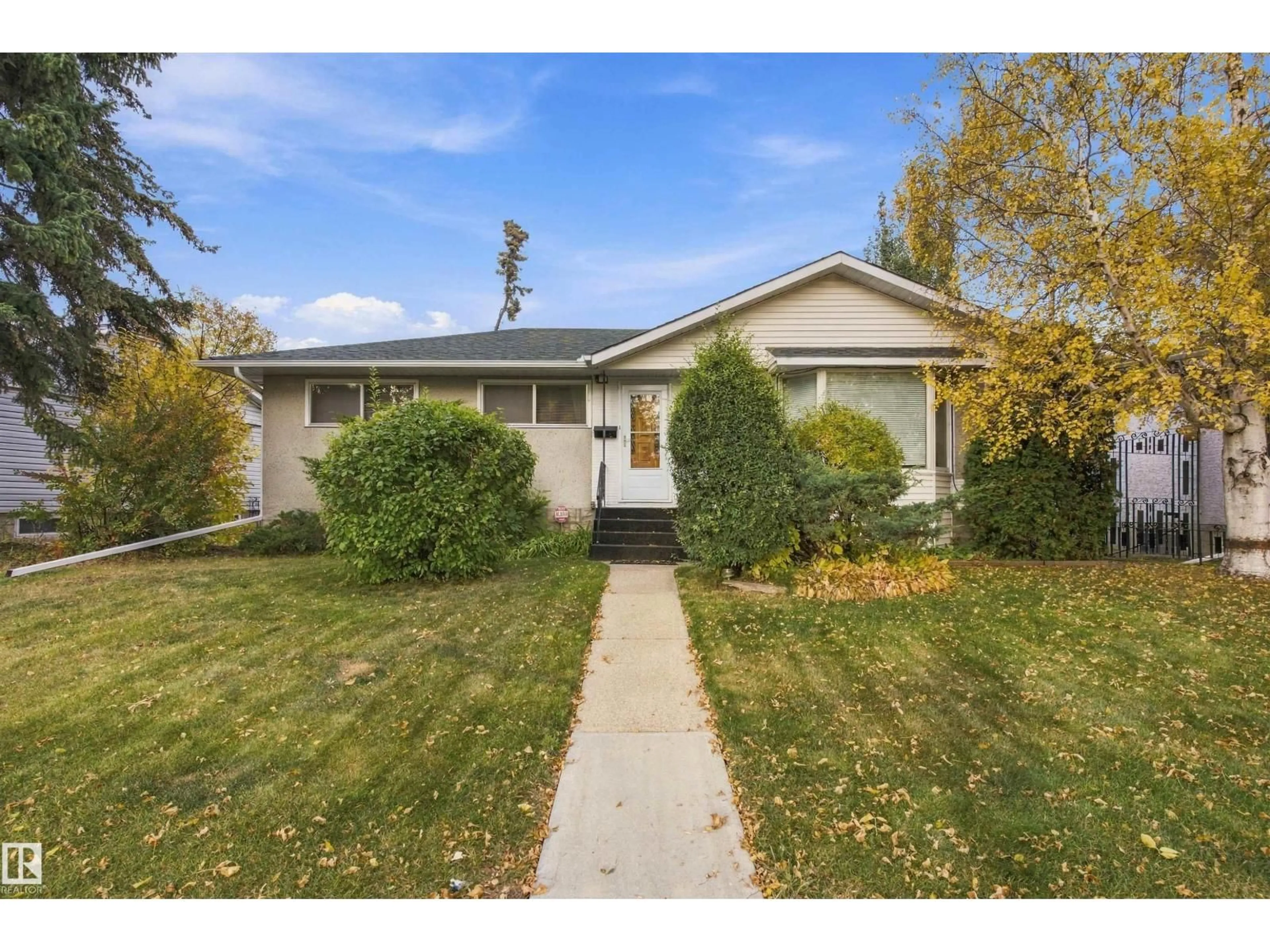 Home with vinyl exterior material, street for 10520 LAUDERDALE RD, Edmonton Alberta T5E5R5