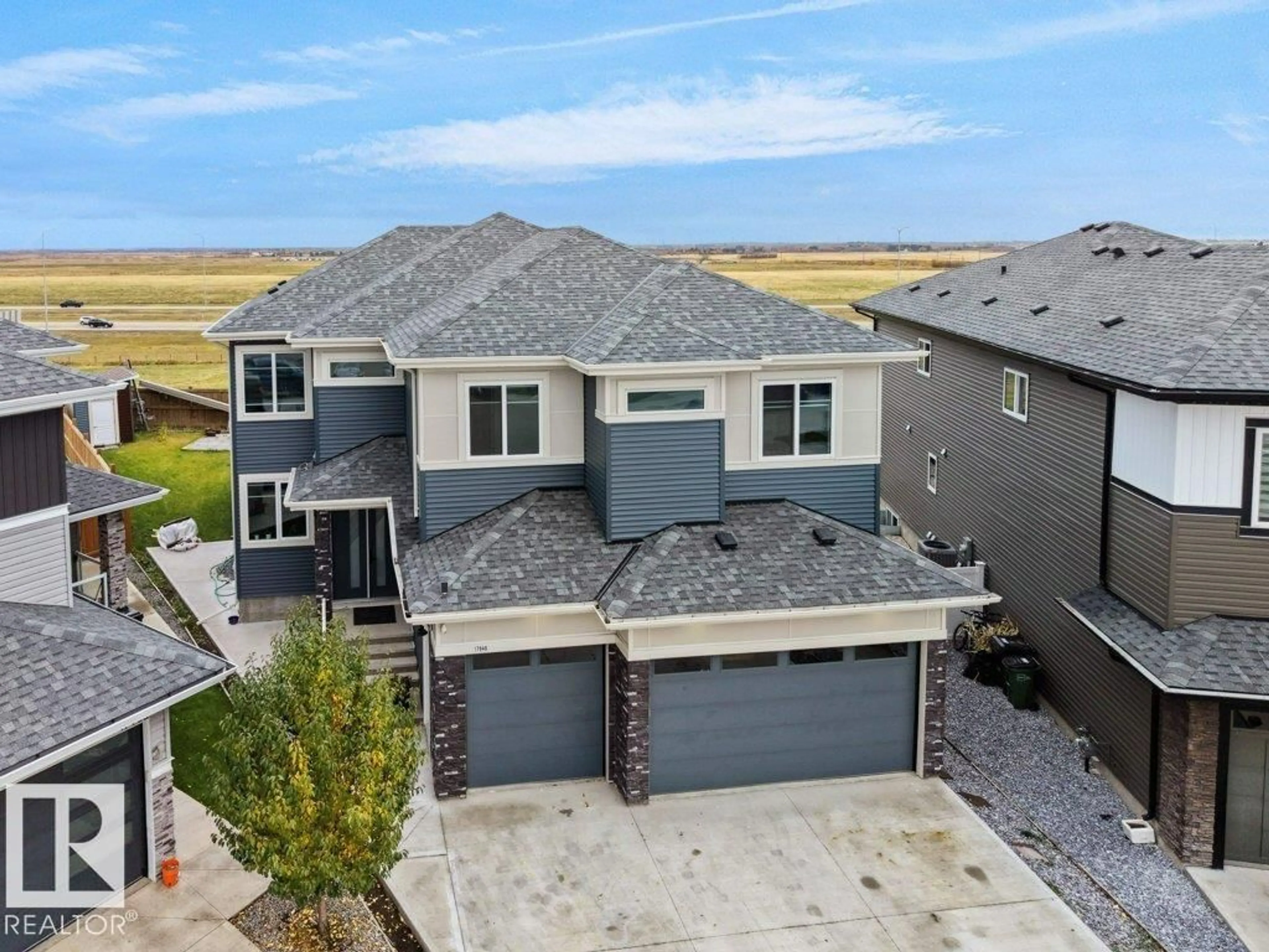 A pic from outside/outdoor area/front of a property/back of a property/a pic from drone, street for 17940 59 ST, Edmonton Alberta T5Y3W8
