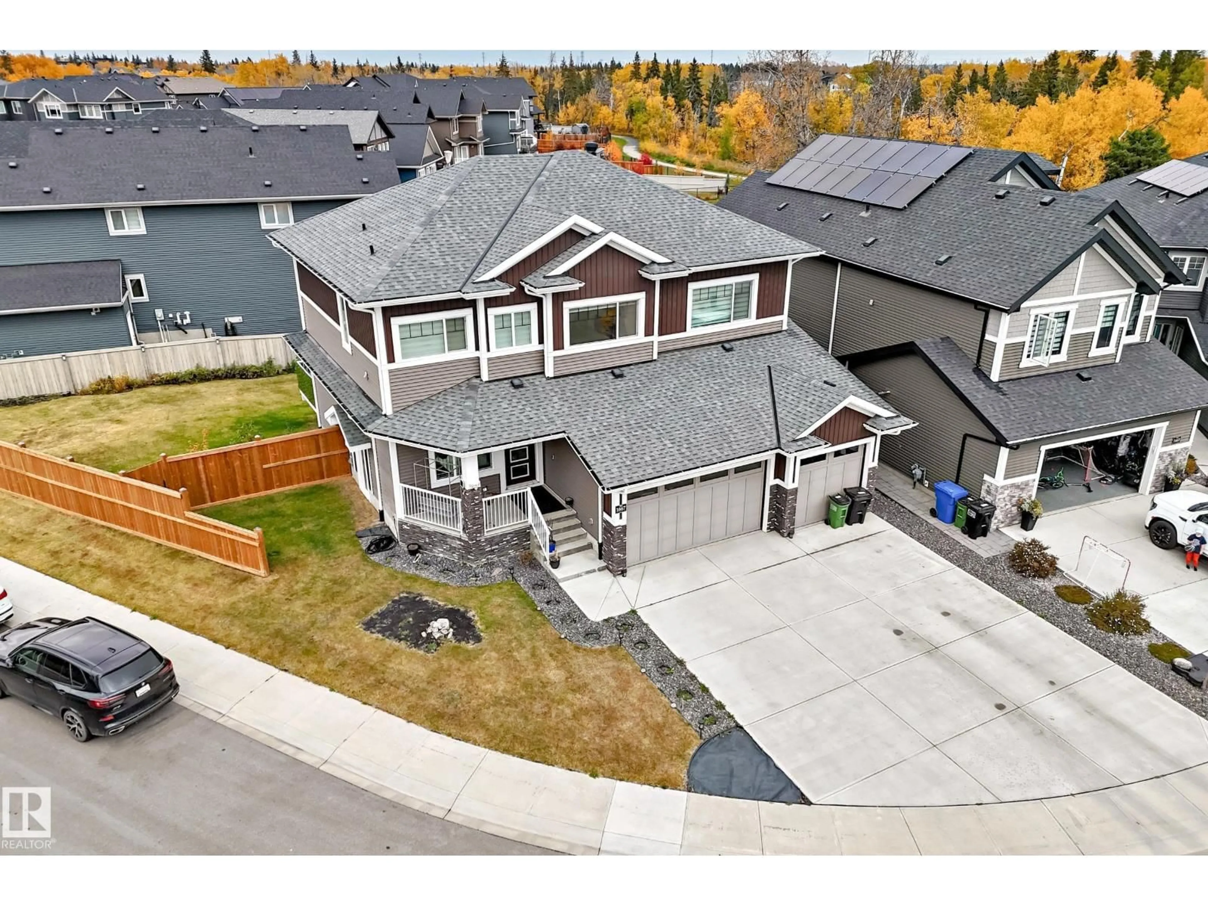 A pic from outside/outdoor area/front of a property/back of a property/a pic from drone, street for 1667 ENRIGHT WY, Edmonton Alberta T6M0Z2