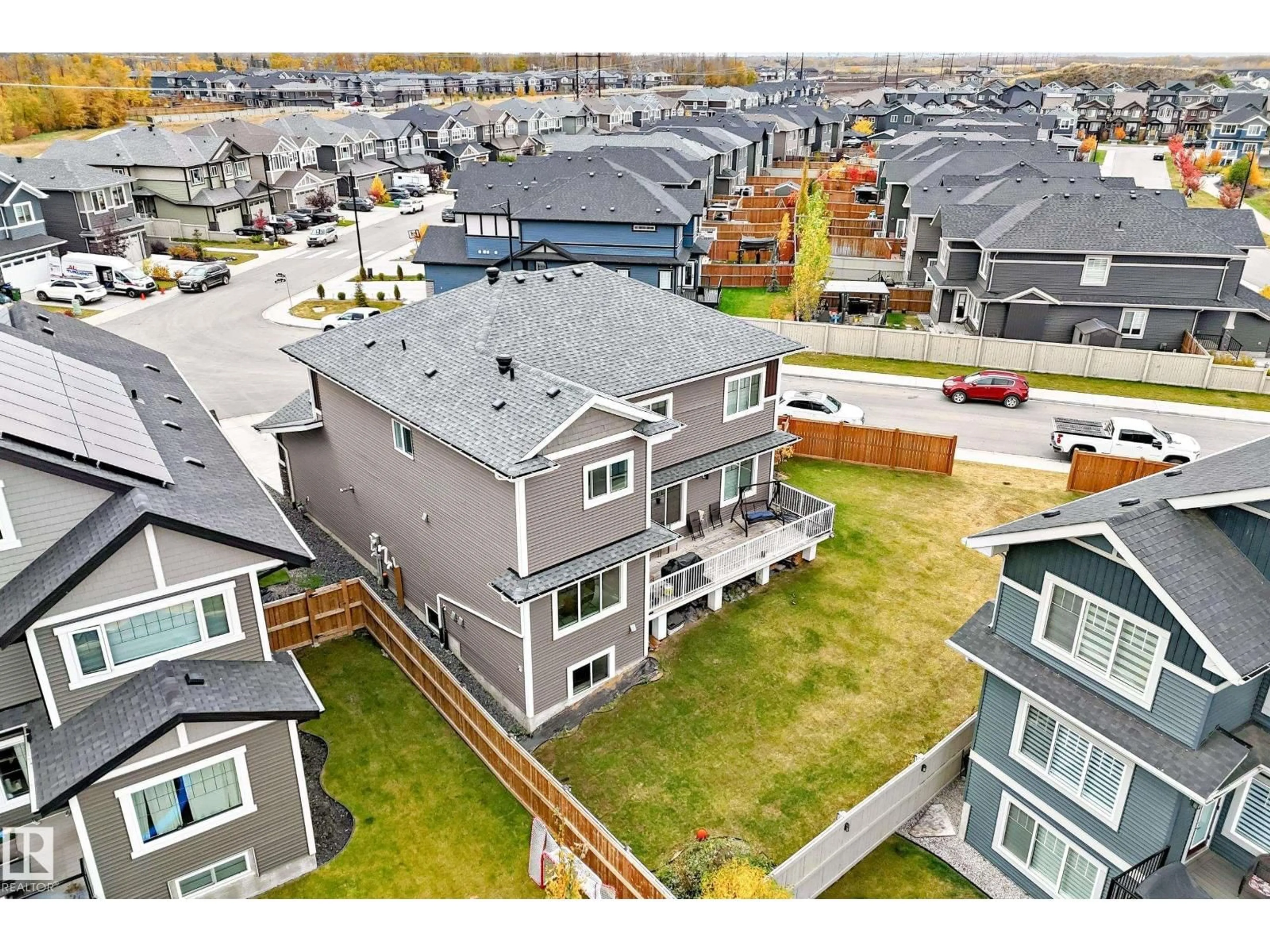 A pic from outside/outdoor area/front of a property/back of a property/a pic from drone, mountain view for 1667 ENRIGHT WY, Edmonton Alberta T6M0Z2