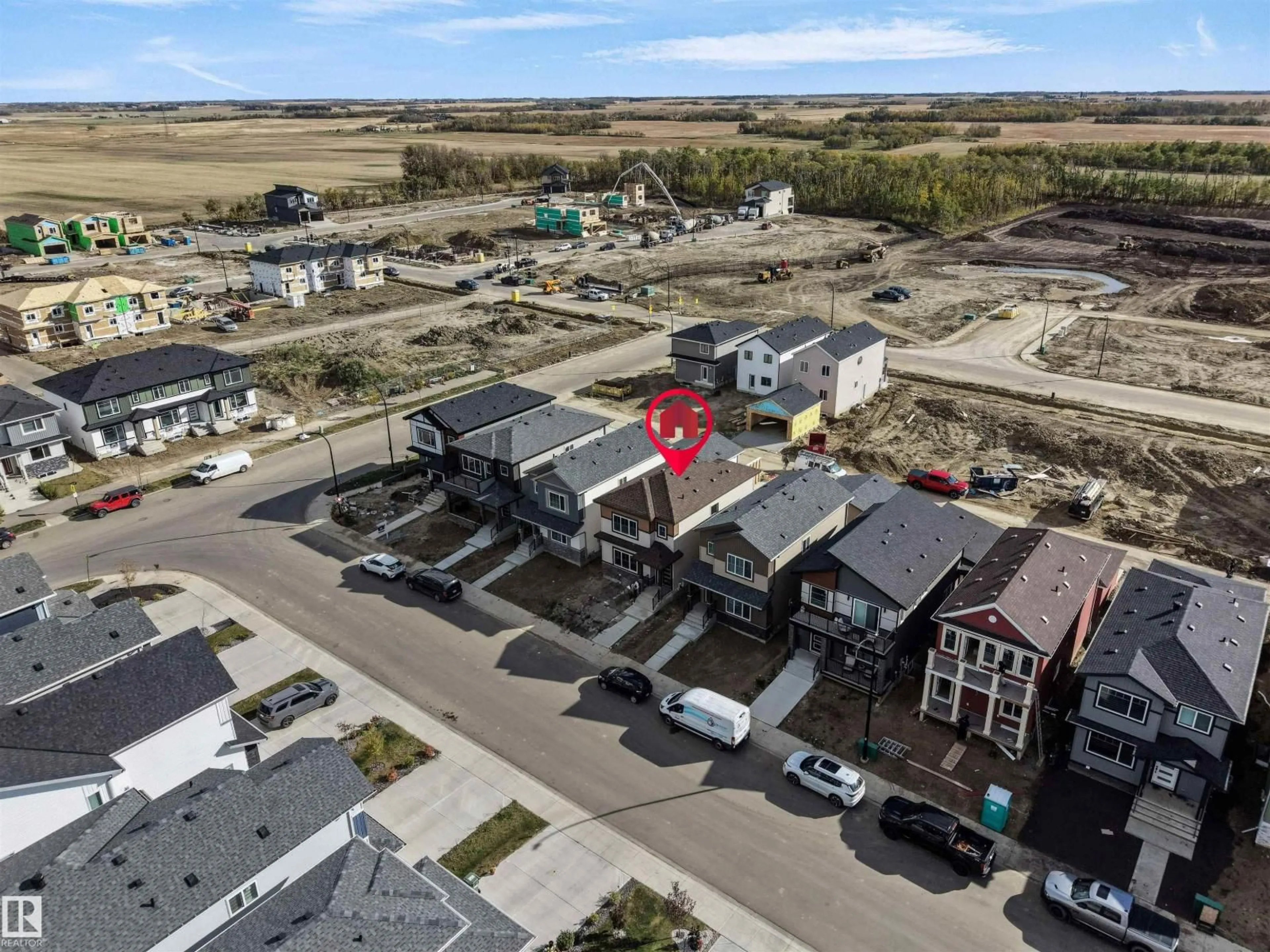 A pic from outside/outdoor area/front of a property/back of a property/a pic from drone, street for 348 ROBERTS WD, Leduc Alberta T9E1P8