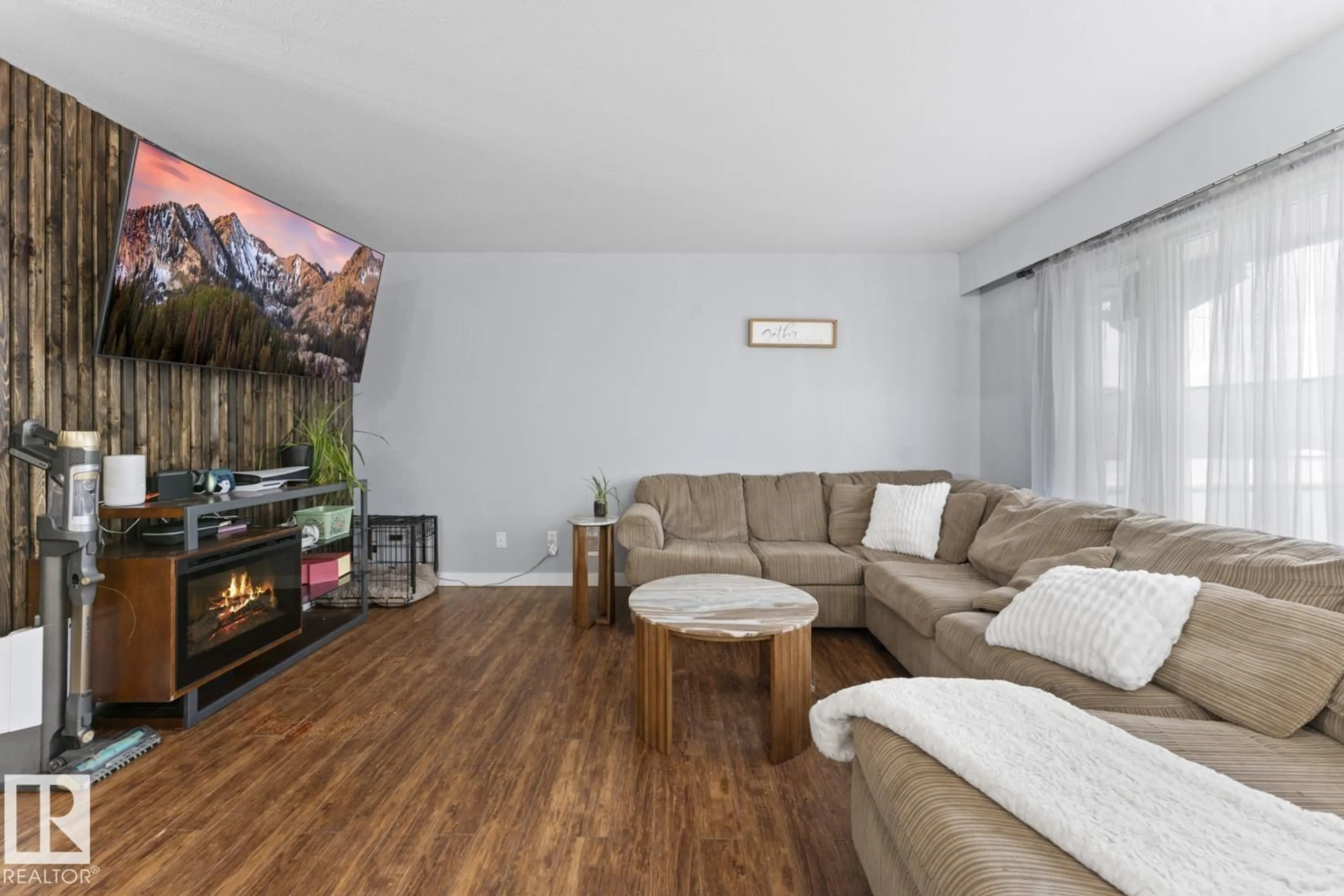 Living room with furniture, wood/laminate floor for 622 13 ST, Cold Lake Alberta T9M1B2