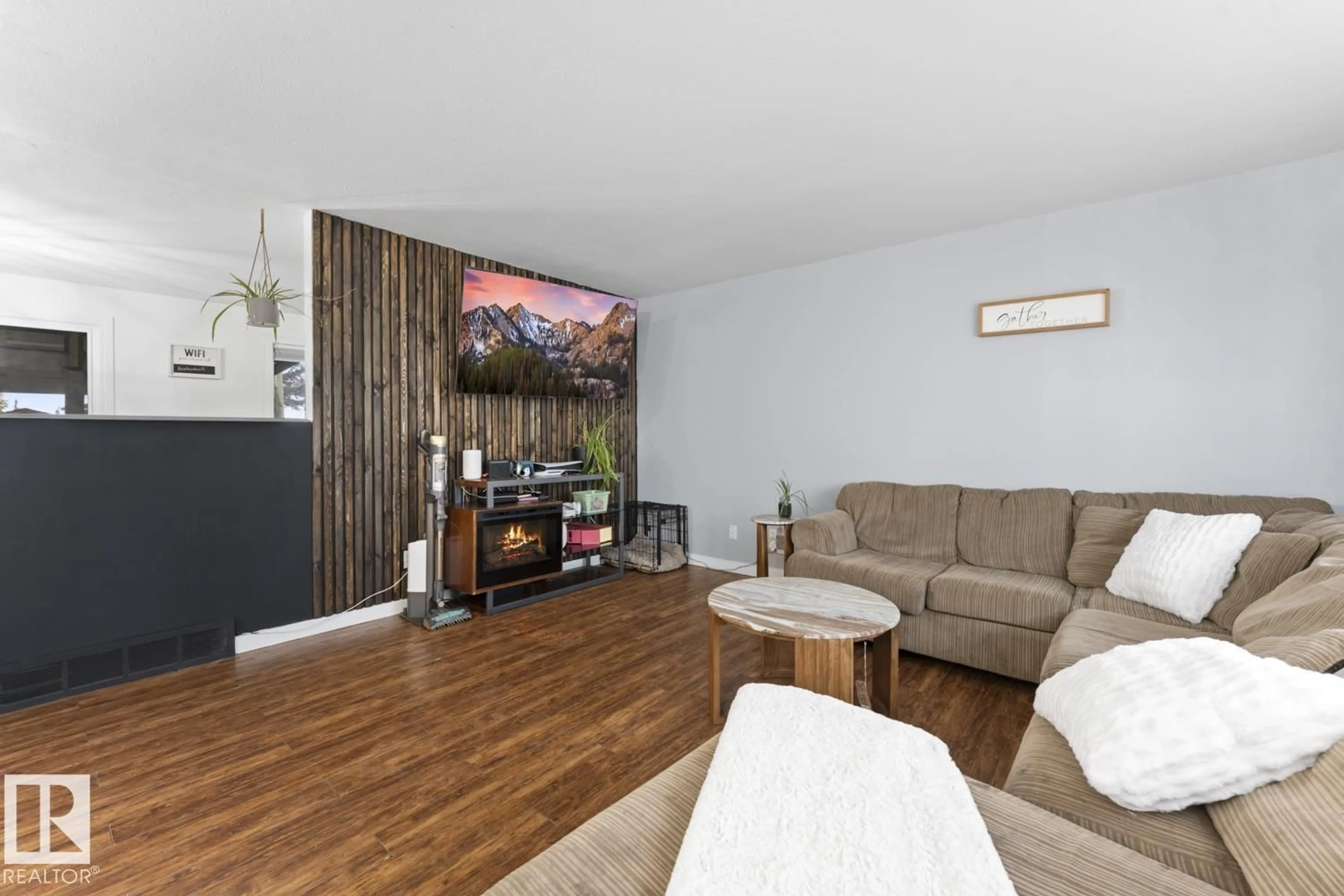 Living room with furniture, wood/laminate floor for 622 13 ST, Cold Lake Alberta T9M1B2