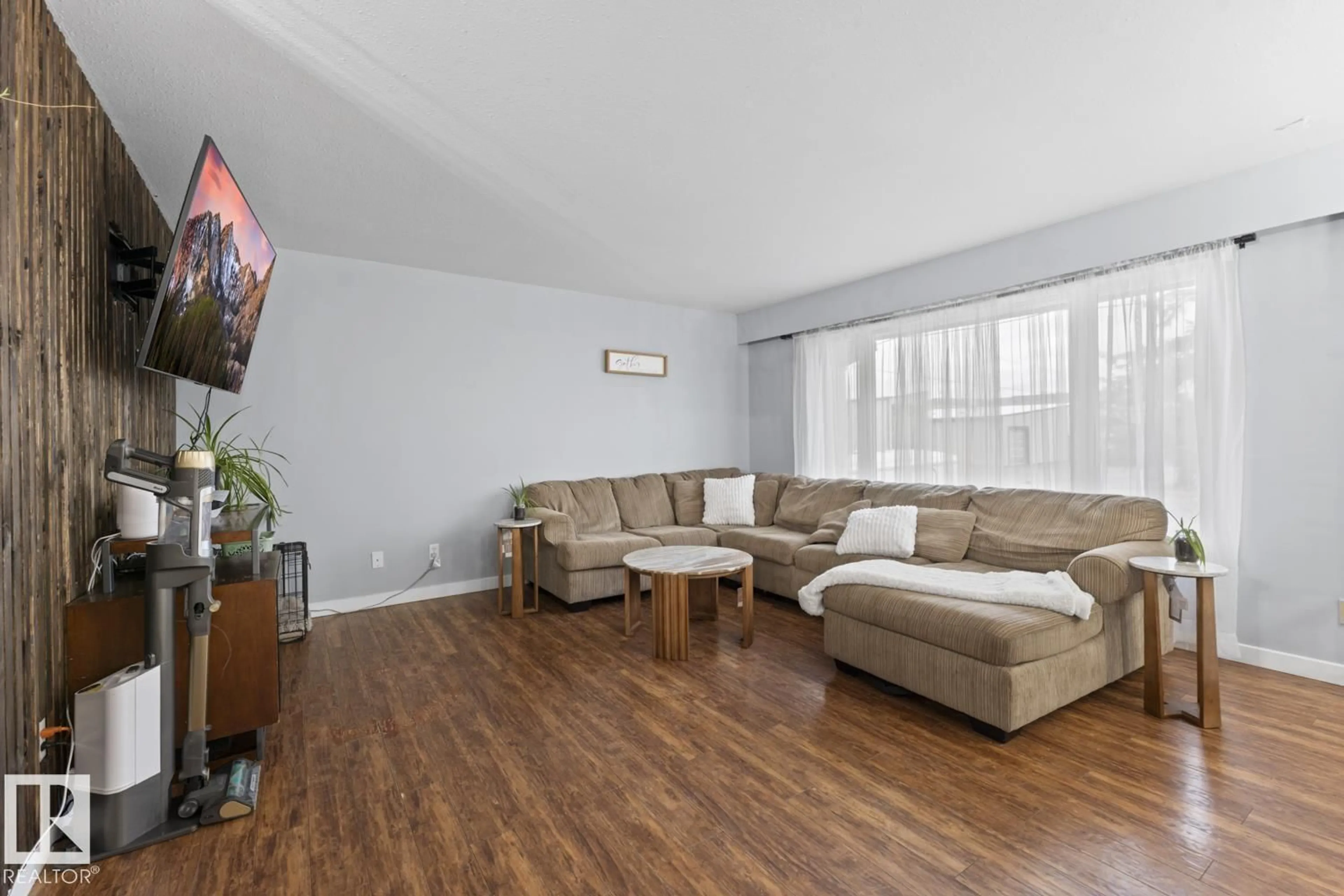 Living room with furniture, wood/laminate floor for 622 13 ST, Cold Lake Alberta T9M1B2