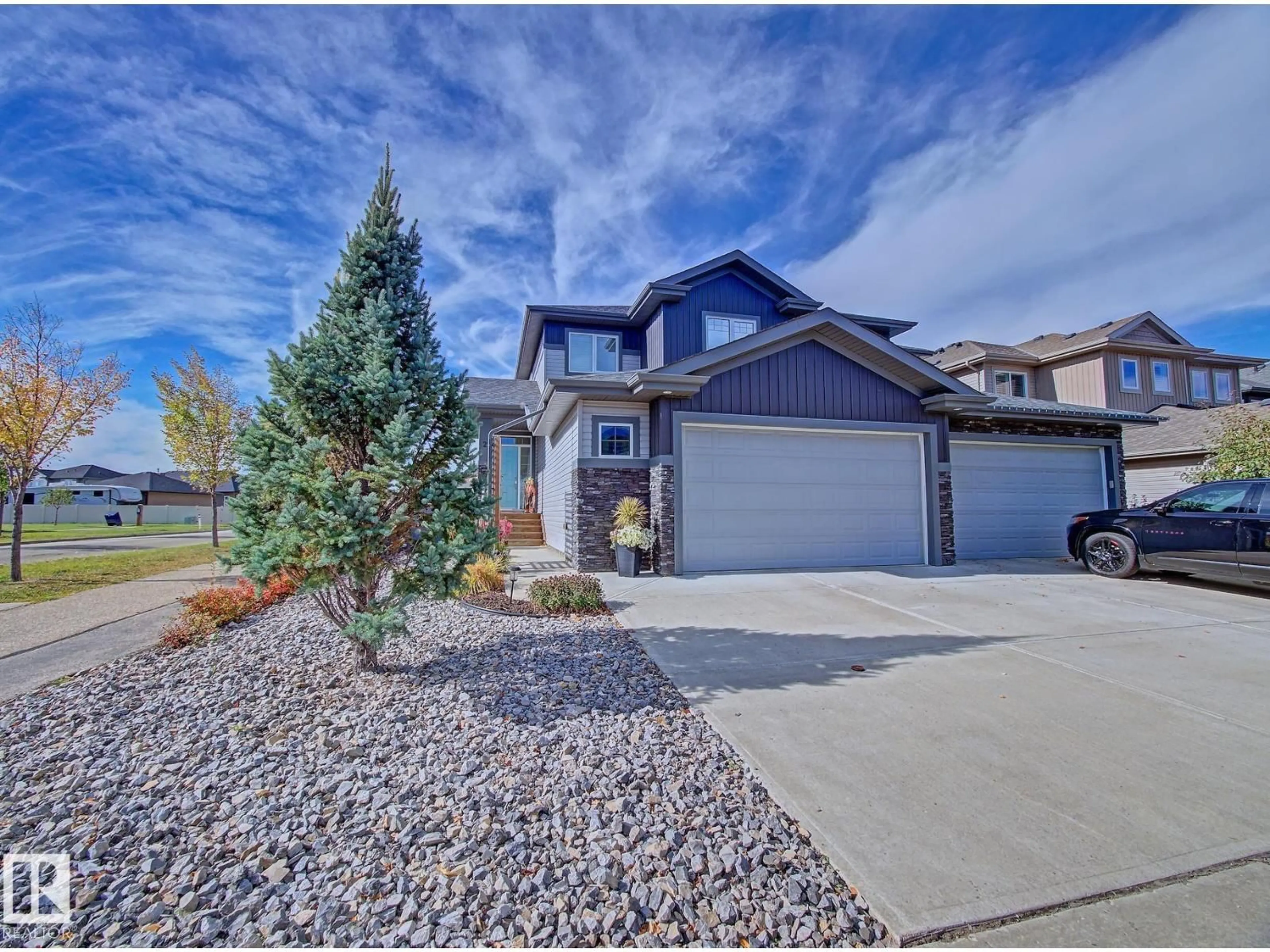 Home with vinyl exterior material, street for 2 DURRAND BN, Fort Saskatchewan Alberta T8L0N2