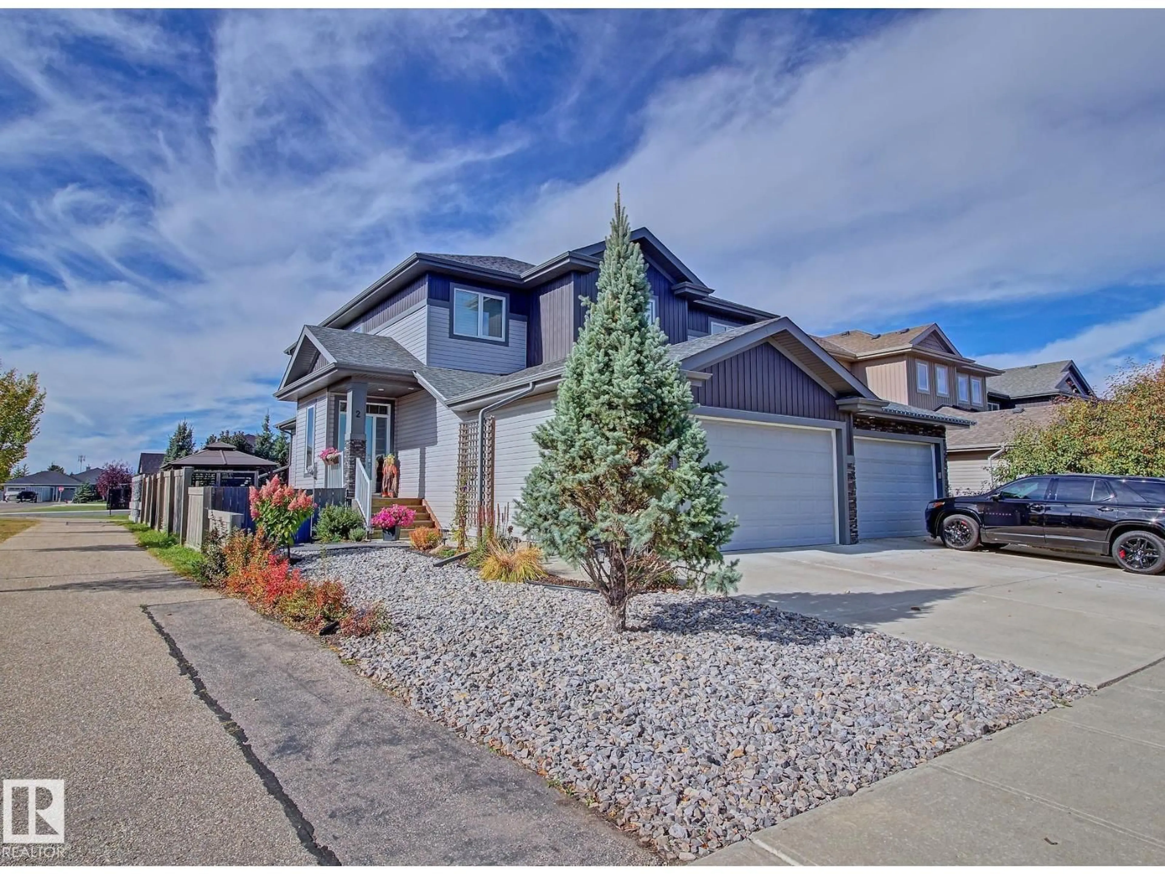 Home with vinyl exterior material, street for 2 DURRAND BN, Fort Saskatchewan Alberta T8L0N2