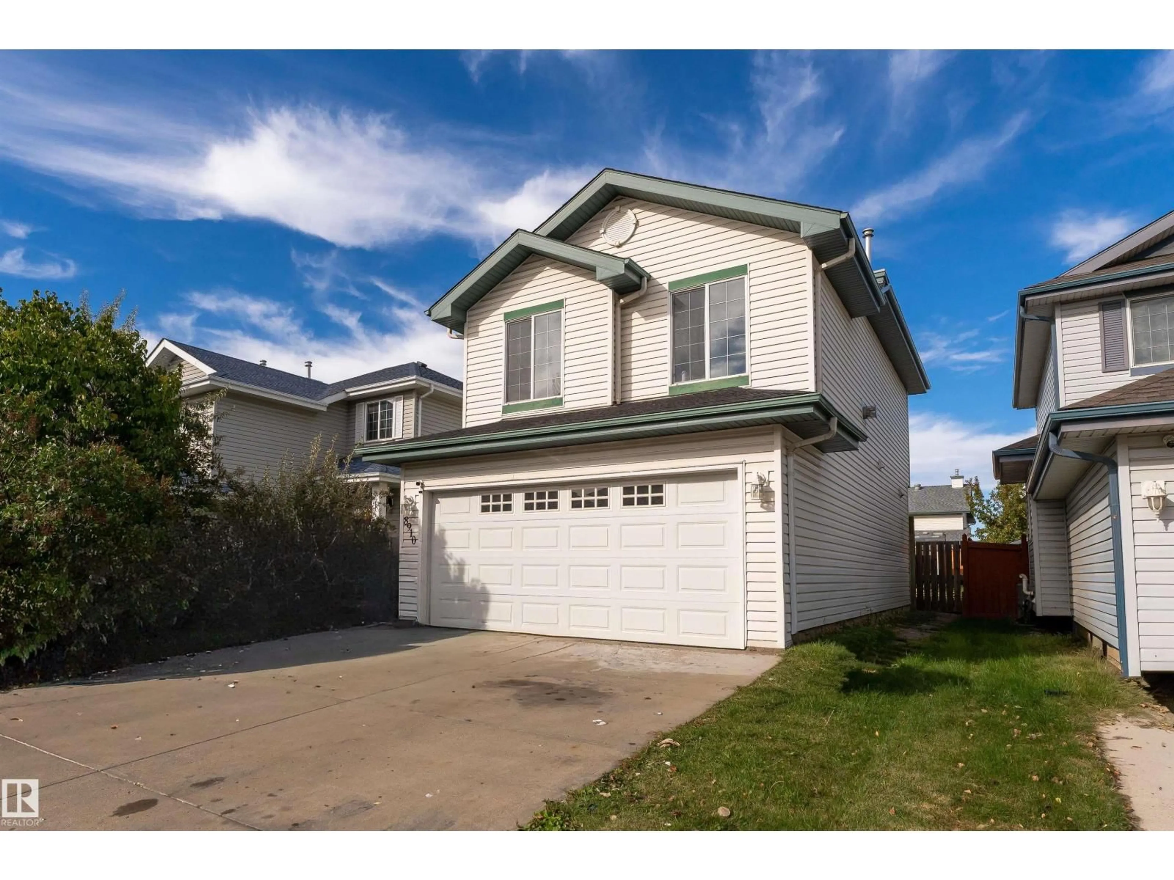 Home with vinyl exterior material, street for 8910 7 AV, Edmonton Alberta T6X1B9