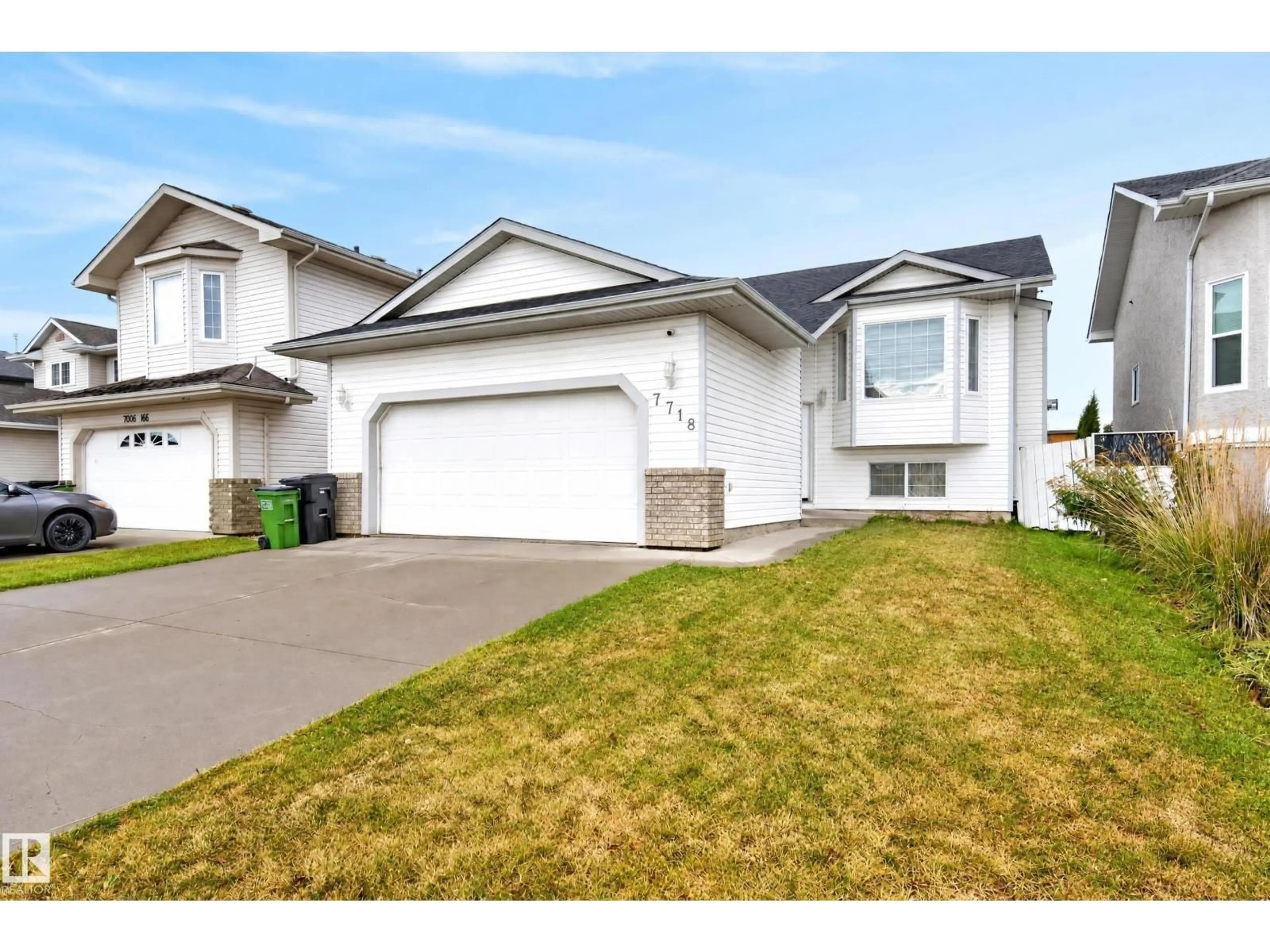 Home with vinyl exterior material, street for 7718 166A AV, Edmonton Alberta T5Z3V9