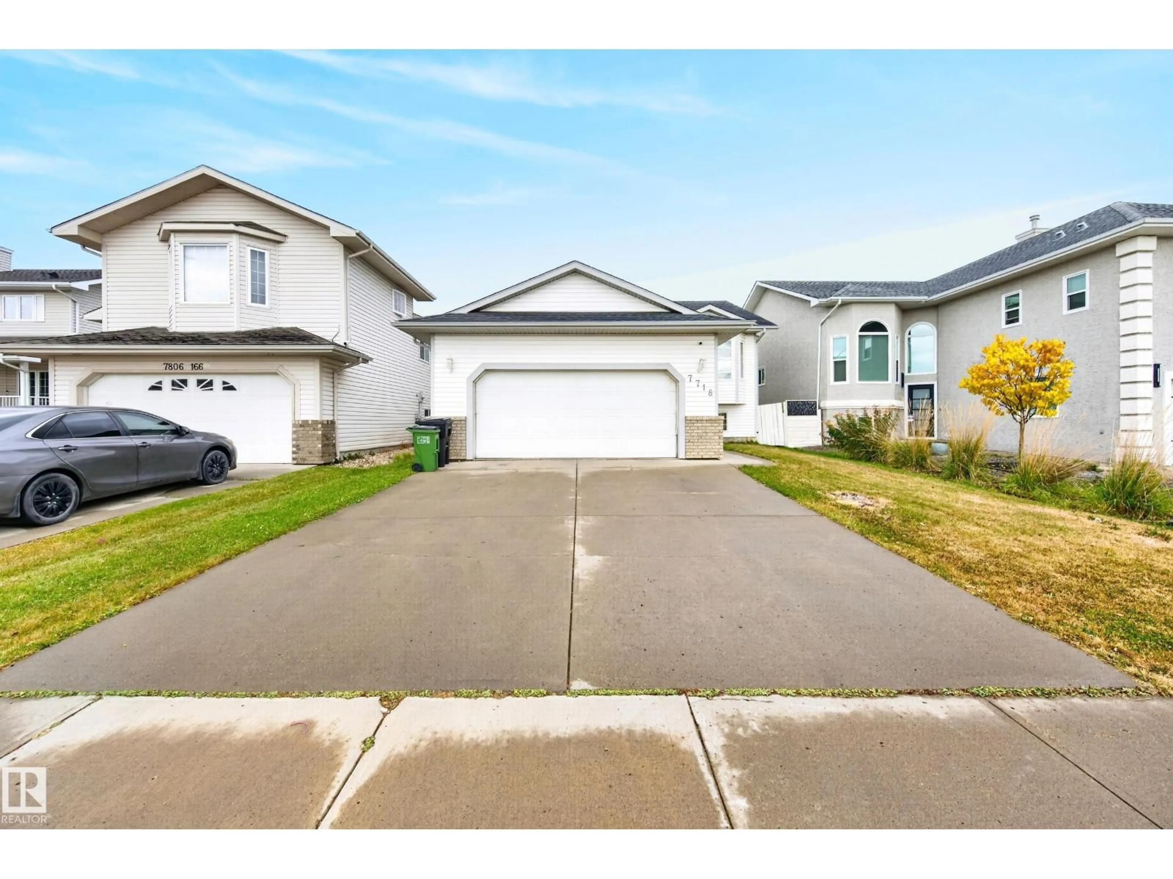 Home with vinyl exterior material, street for 7718 166A AV, Edmonton Alberta T5Z3V9