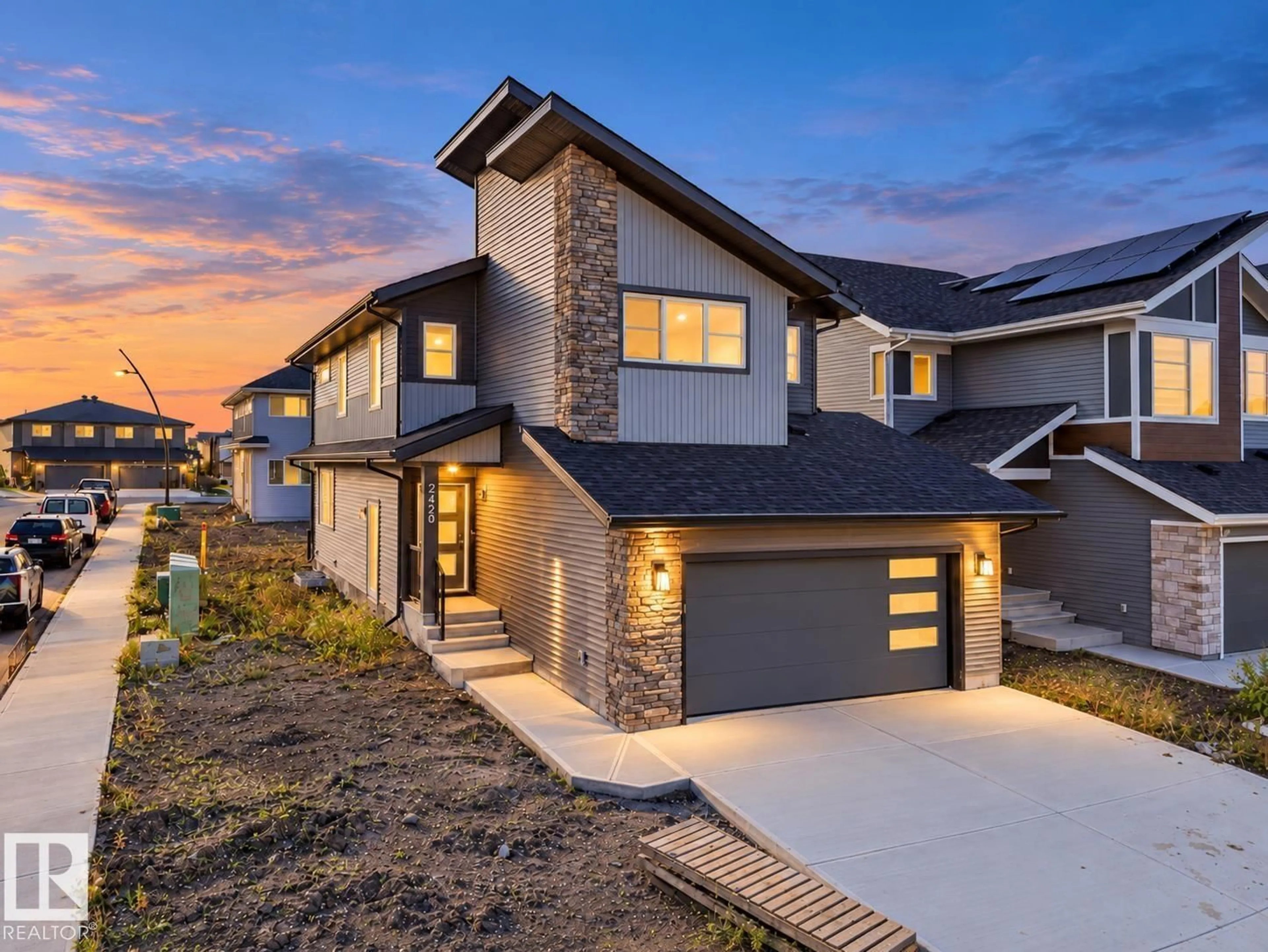 Home with brick exterior material, street for NW - 2420 205 ST, Edmonton Alberta T6M1N6