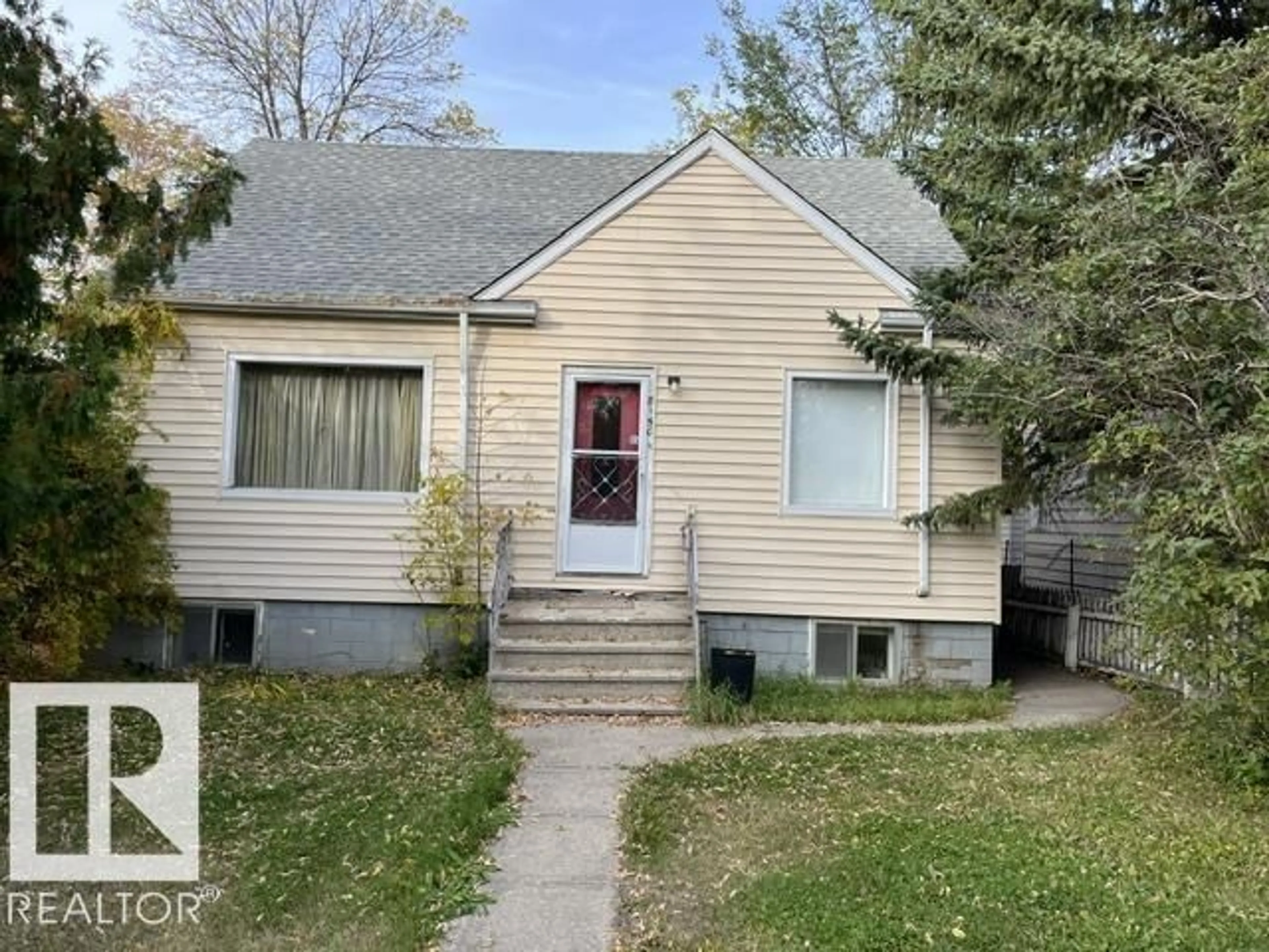 Home with vinyl exterior material, street for 8150 78 AV, Edmonton Alberta T6C0N4