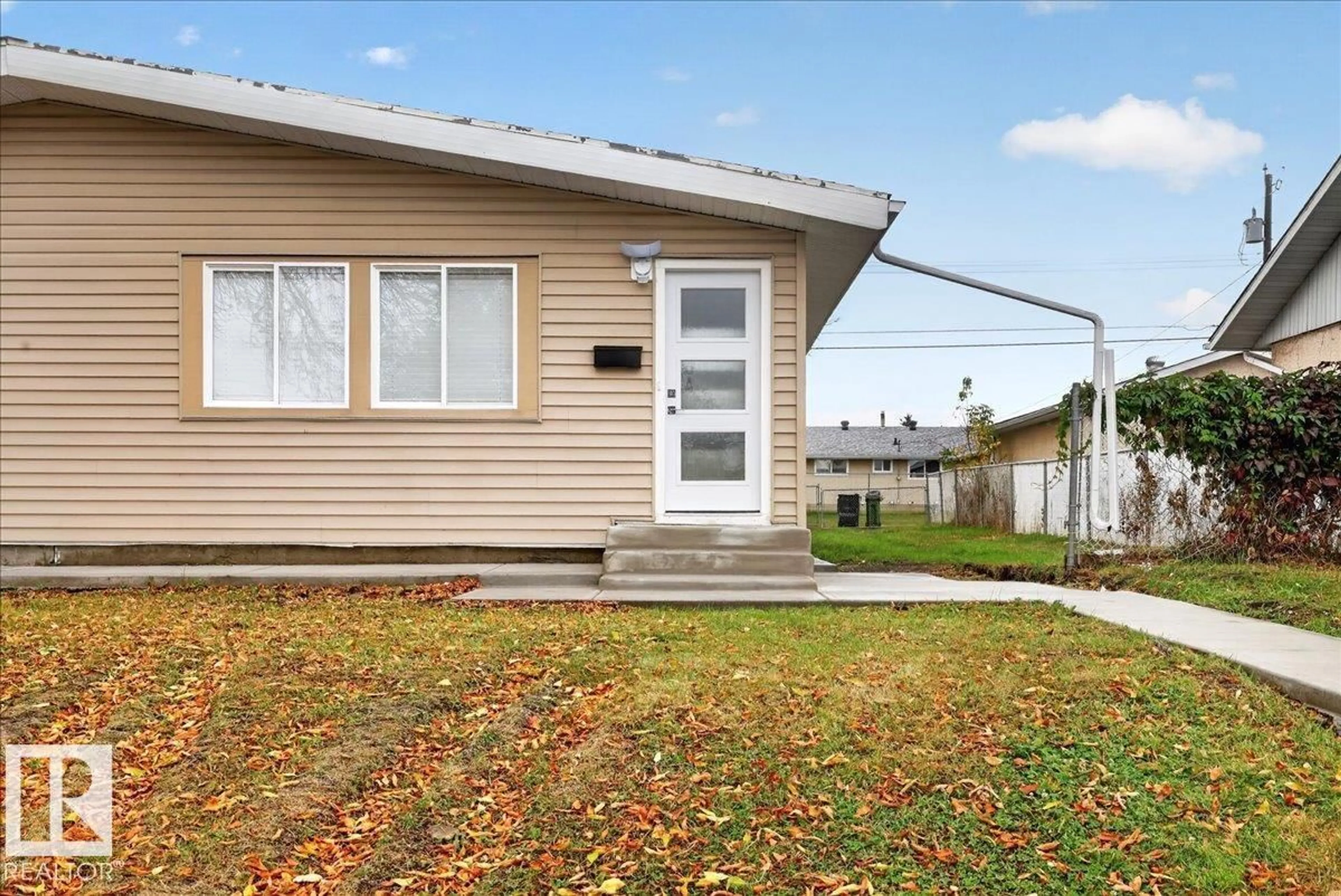 Home with vinyl exterior material, street for NW - 13246 59 ST, Edmonton Alberta T5A0R7