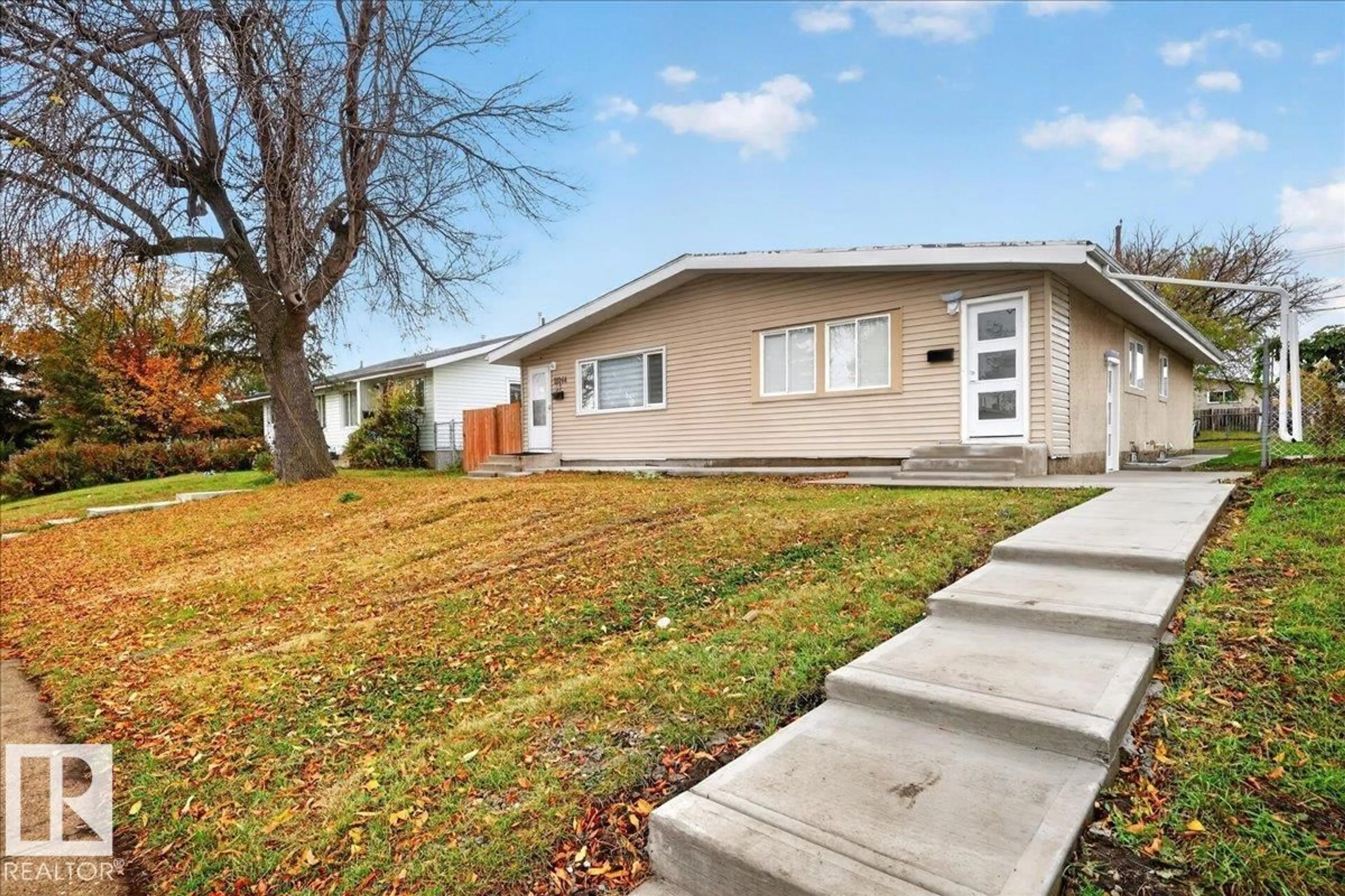 Home with vinyl exterior material, street for NW - 13246 59 ST, Edmonton Alberta T5A0R7