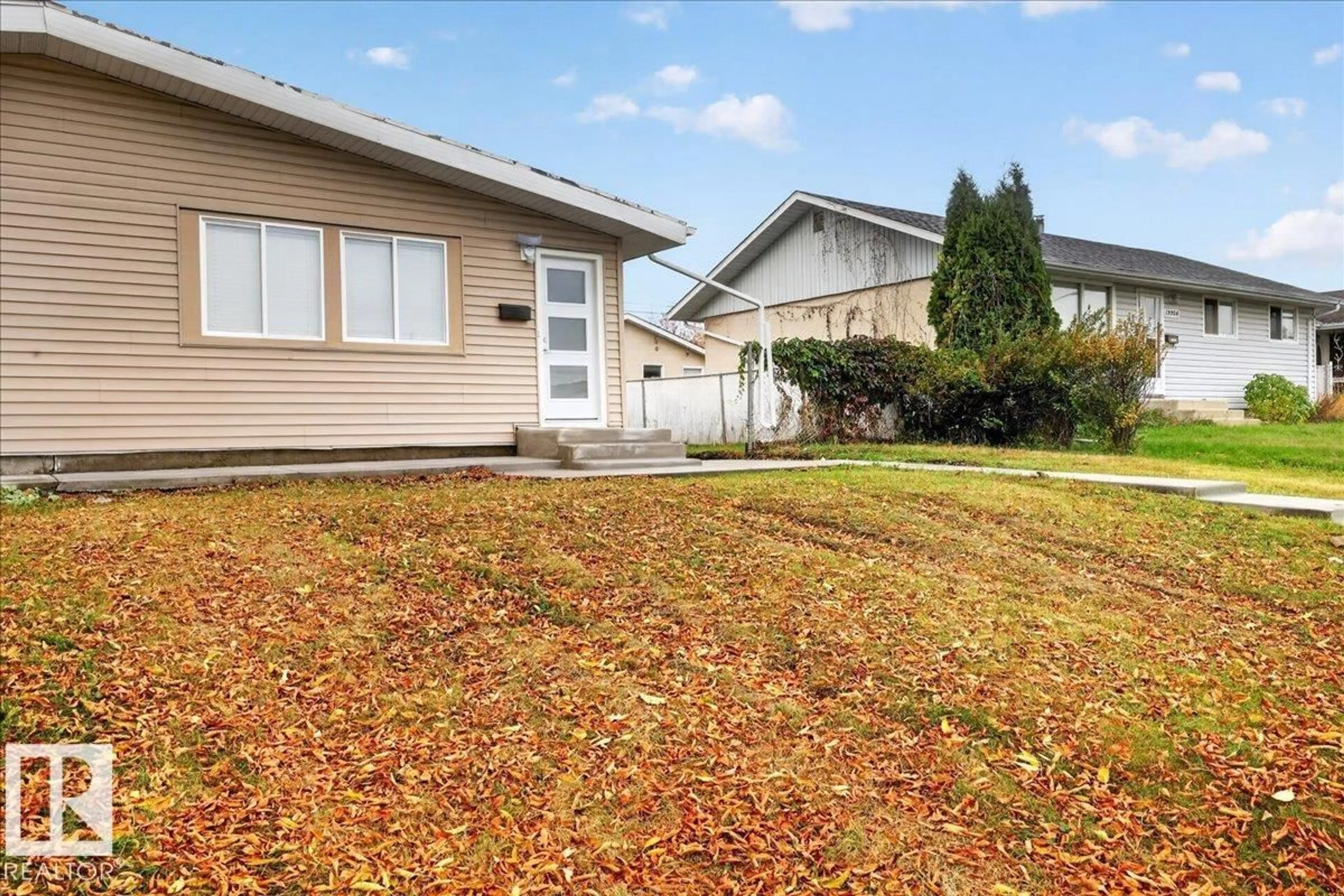 Home with vinyl exterior material, street for NW - 13246 59 ST, Edmonton Alberta T5A0R7