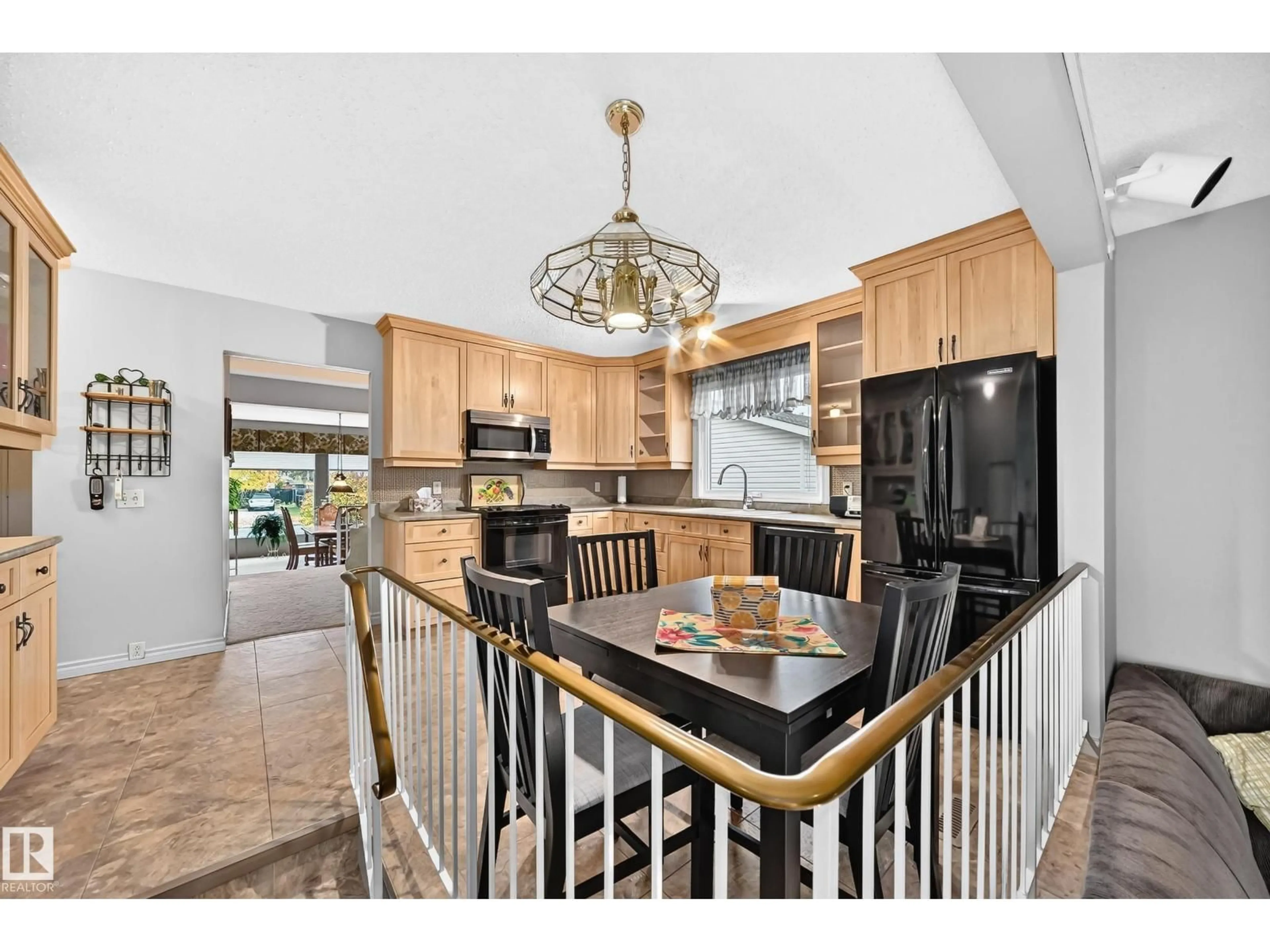 Open concept kitchen, ceramic/tile floor for 8612 176 ST, Edmonton Alberta T5T0N3
