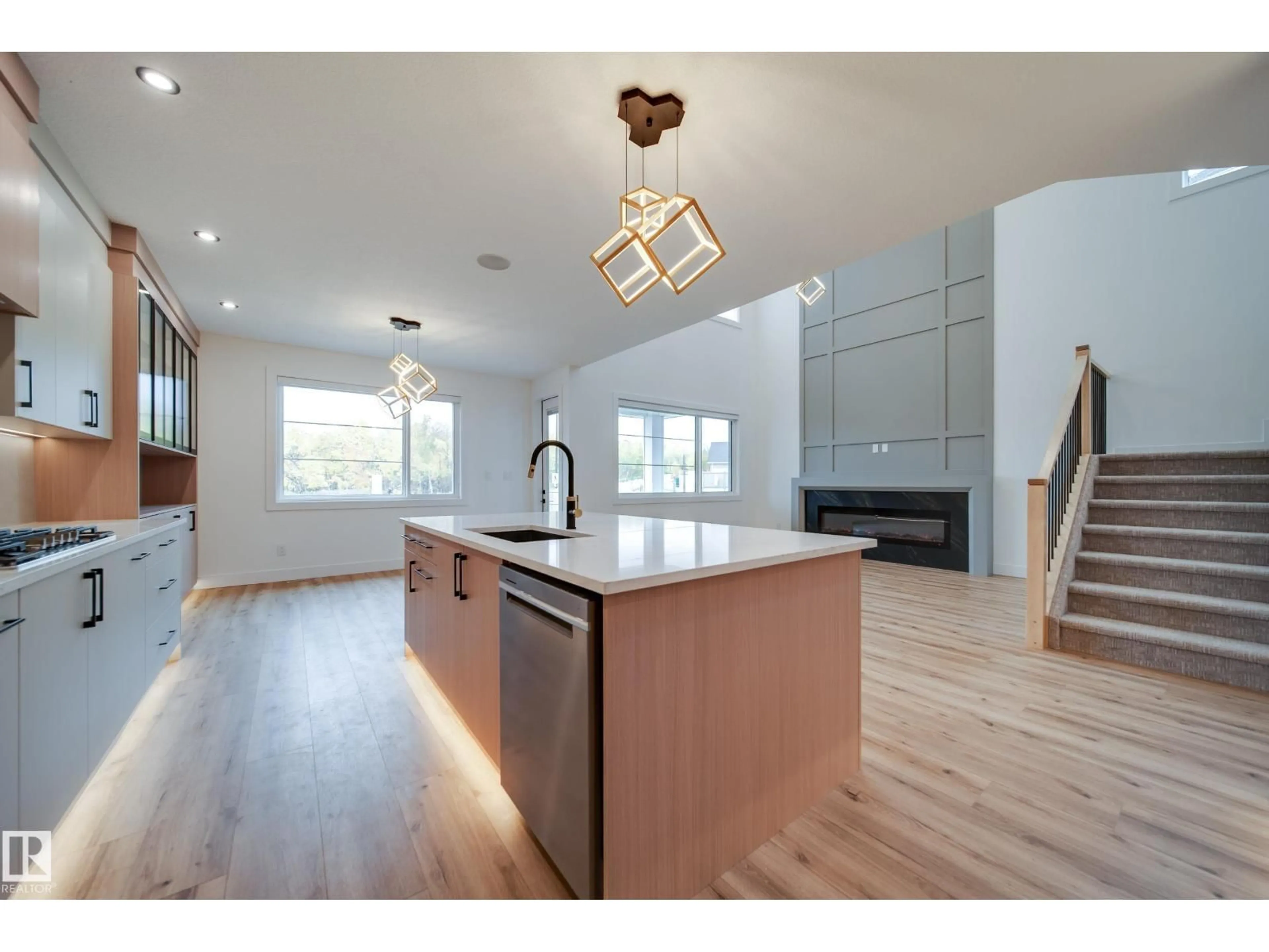 Open concept kitchen, wood/laminate floor for 3142 MAGPIE WY, Edmonton Alberta T5S0V4