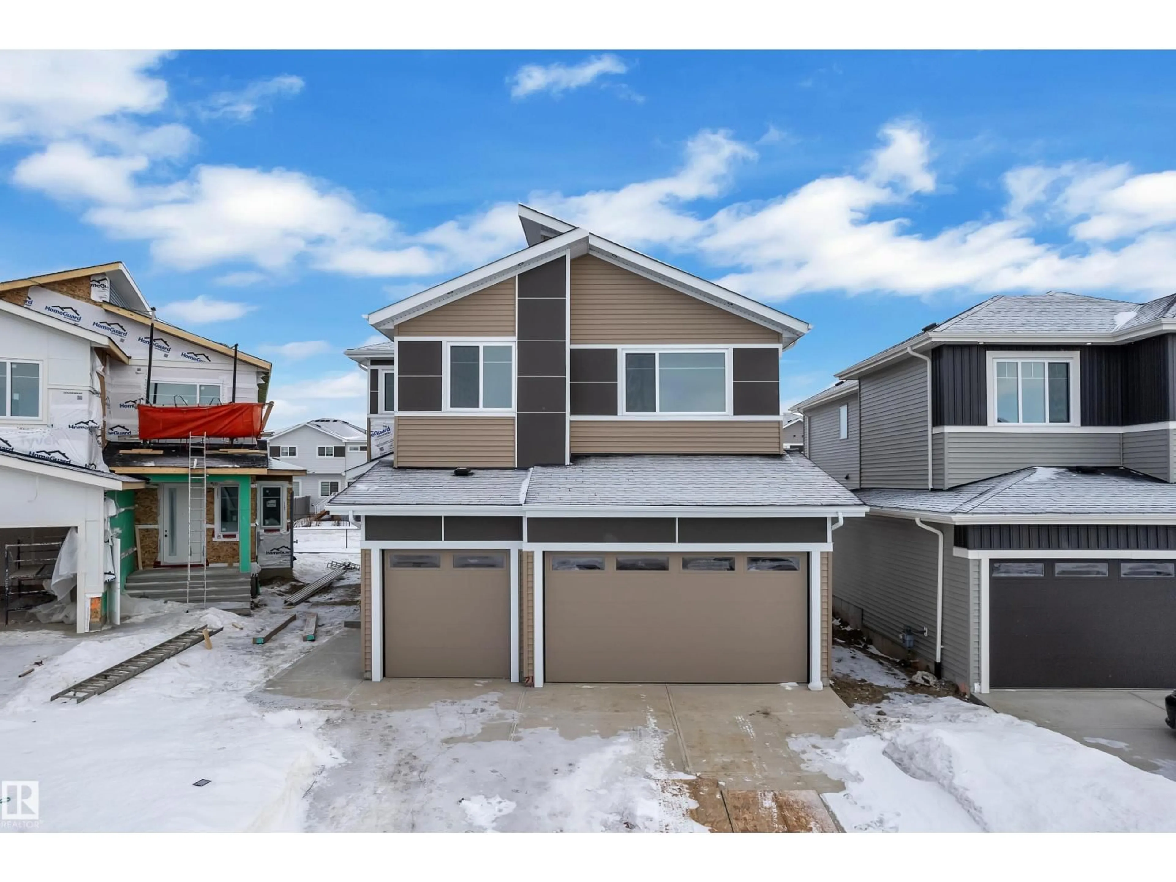 Home with vinyl exterior material, street for 211 BASIN CO, Leduc Alberta T9E1T6