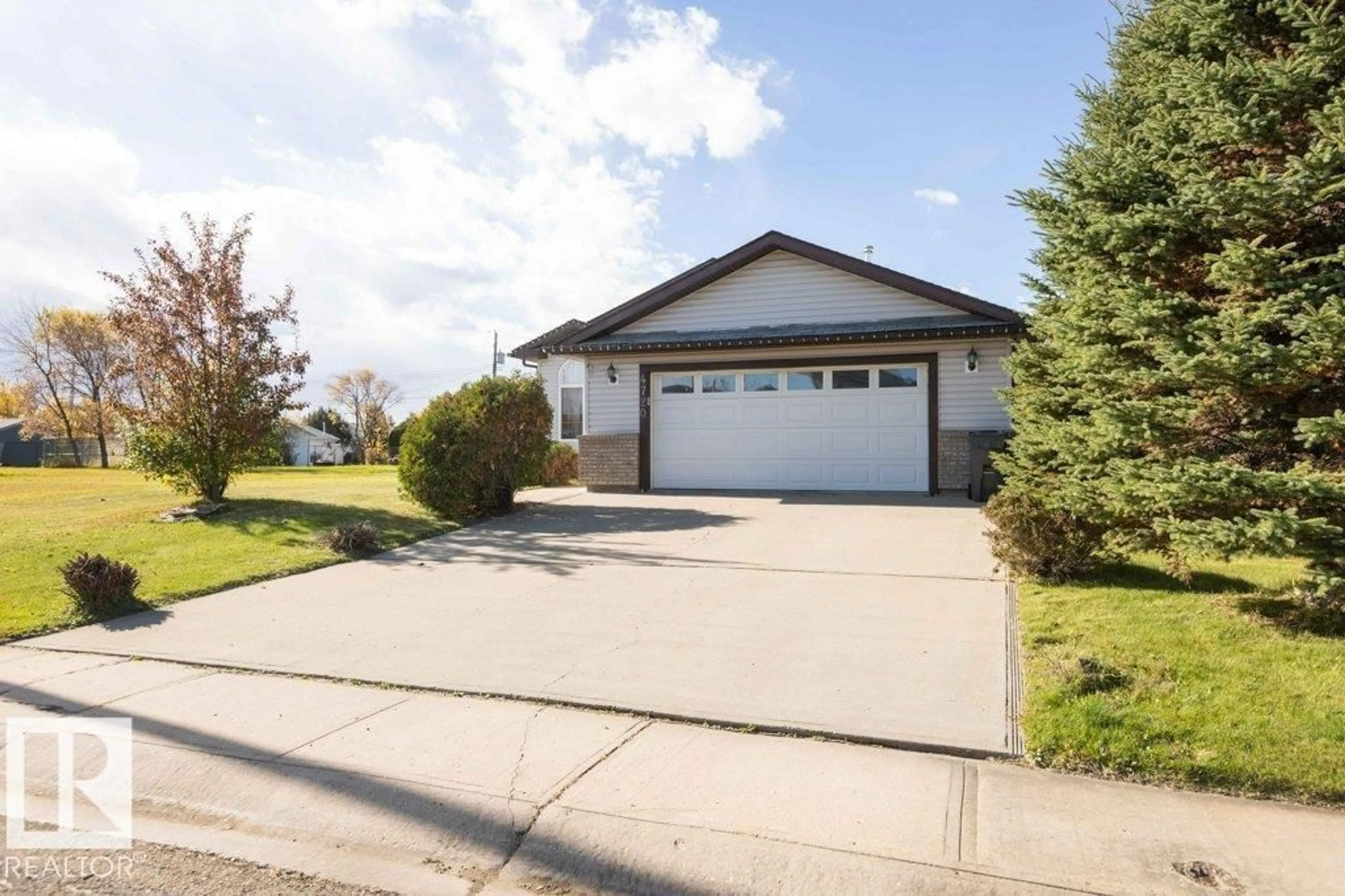 Home with vinyl exterior material, street for 4720 47 ST, Clyde Alberta T0G0P0