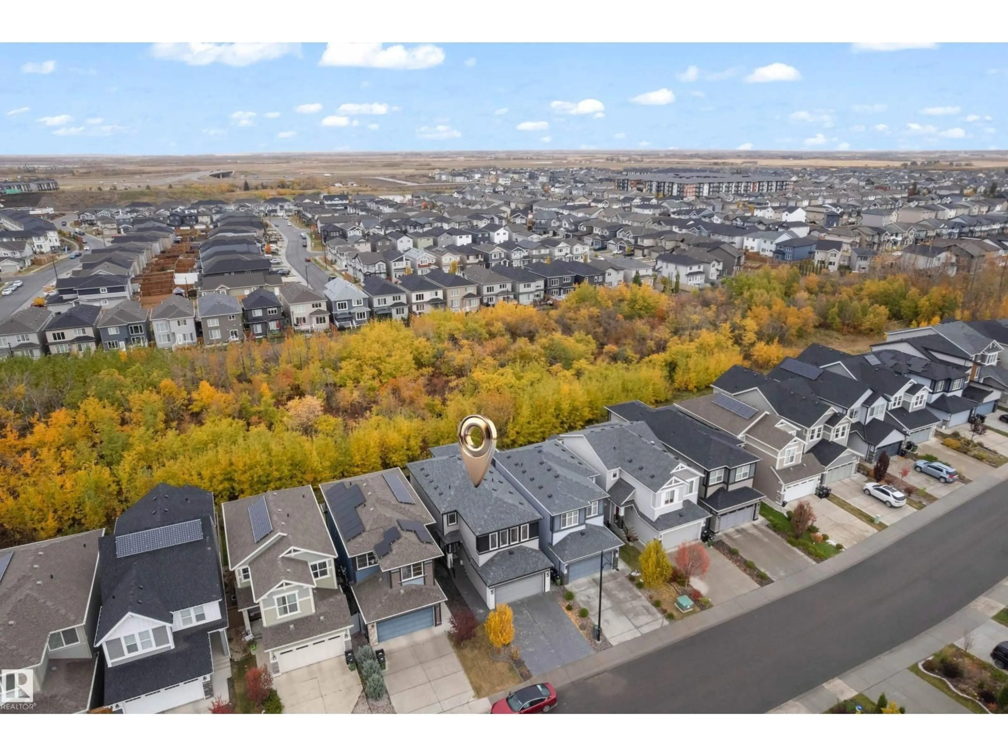 A pic from outside/outdoor area/front of a property/back of a property/a pic from drone, street for 6364 174 AV, Edmonton Alberta T5Y3Y3