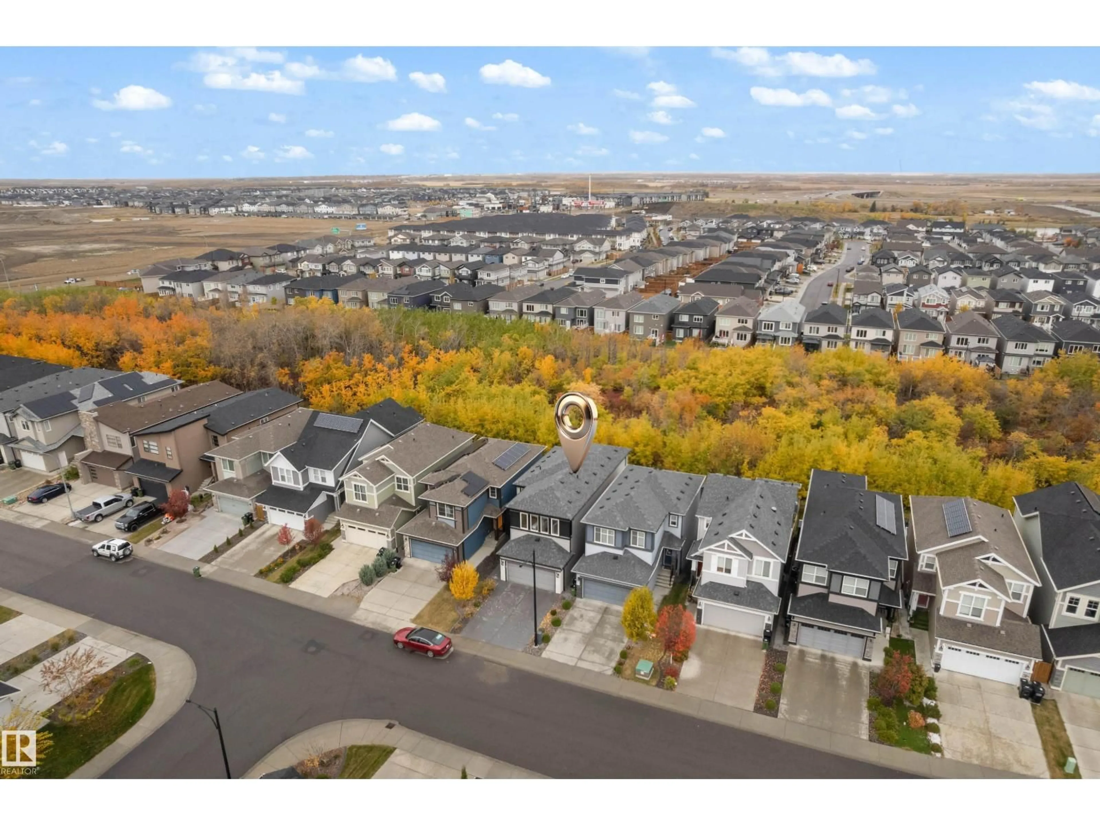 A pic from outside/outdoor area/front of a property/back of a property/a pic from drone, street for 6364 174 AV, Edmonton Alberta T5Y3Y3