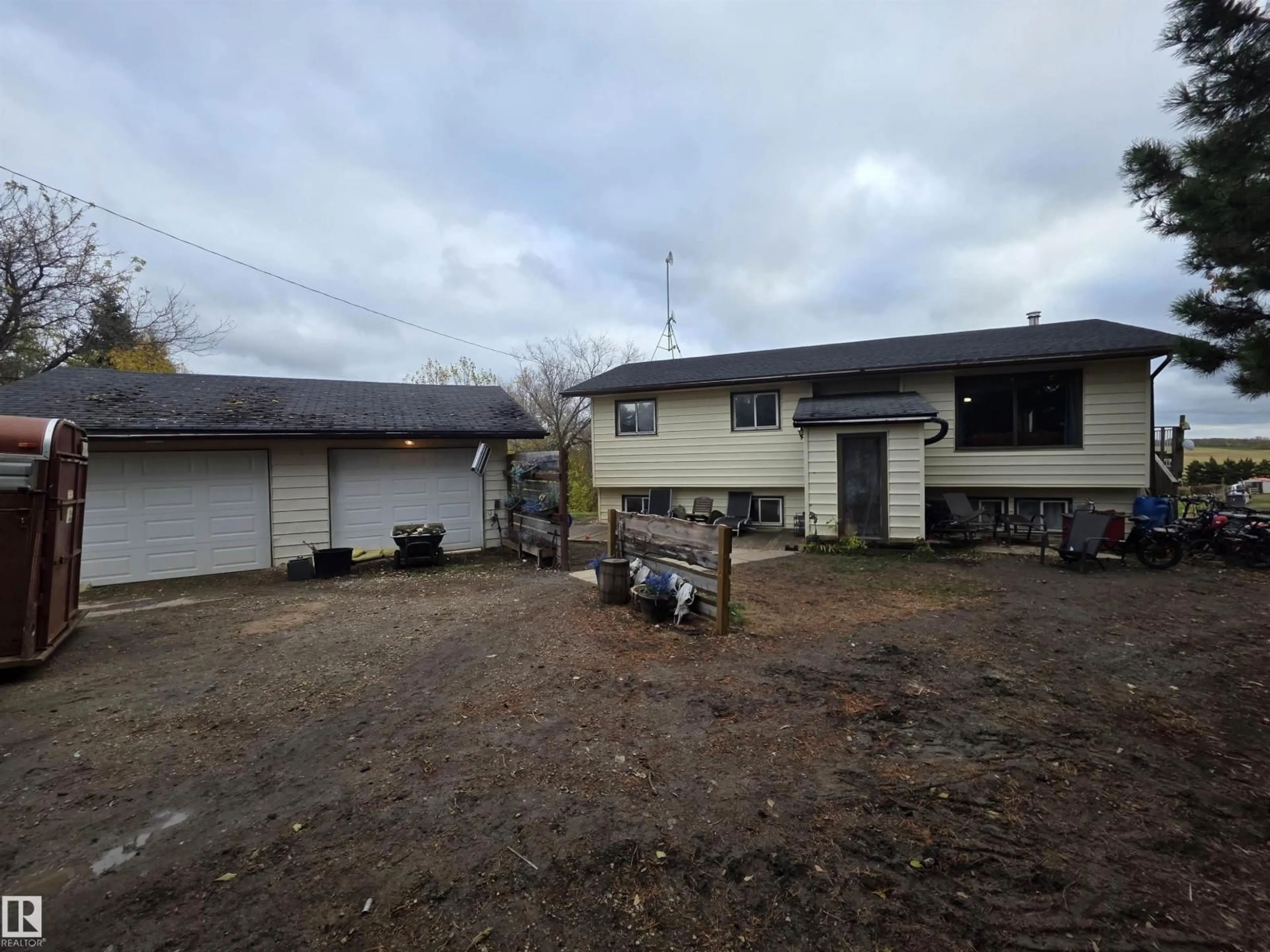 A pic from outside/outdoor area/front of a property/back of a property/a pic from drone, street for 28 53111 RGE ROAD 22, Rural Parkland County Alberta T7Y2J4