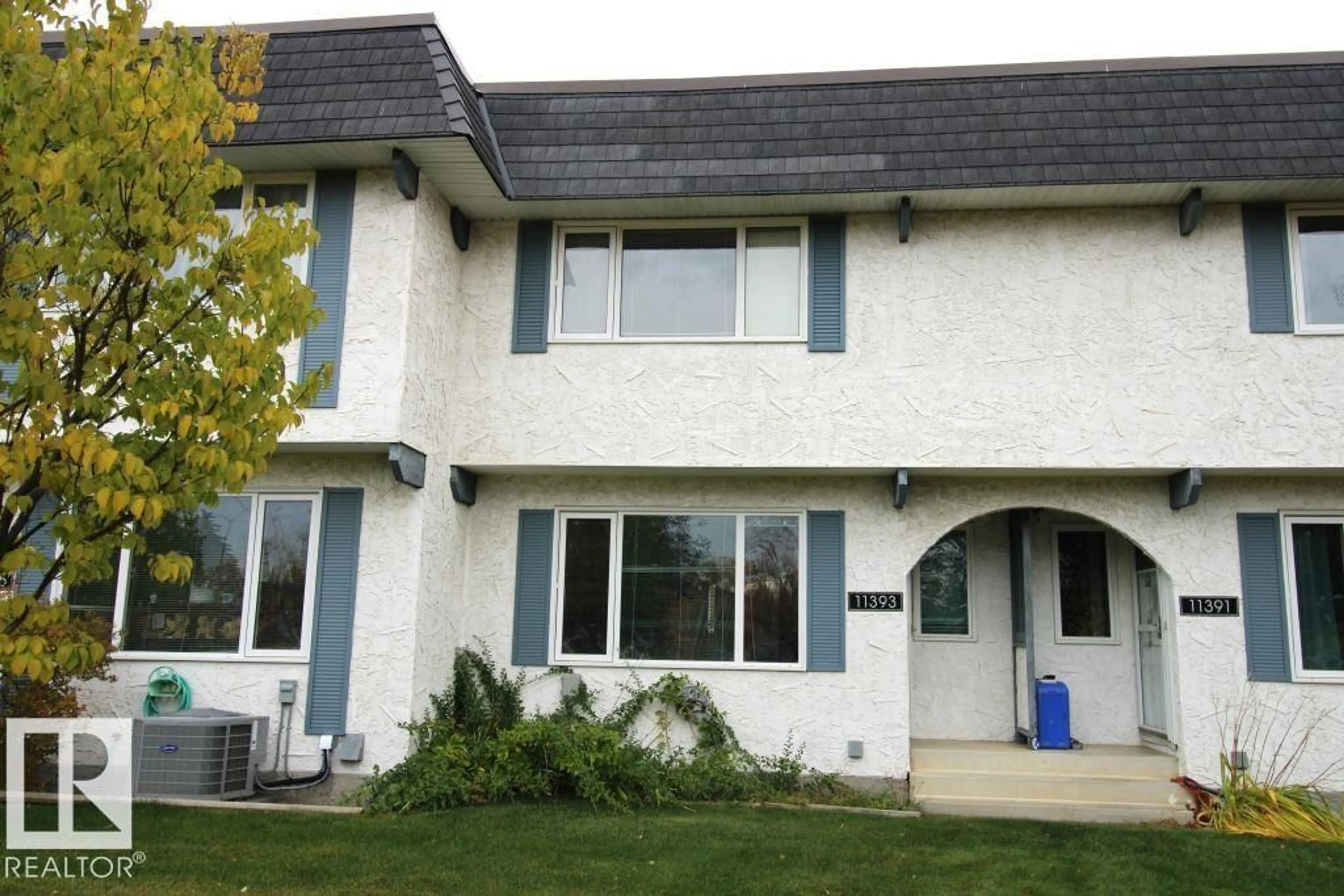Home with vinyl exterior material, street for 11393 22 AV, Edmonton Alberta T6J4V8