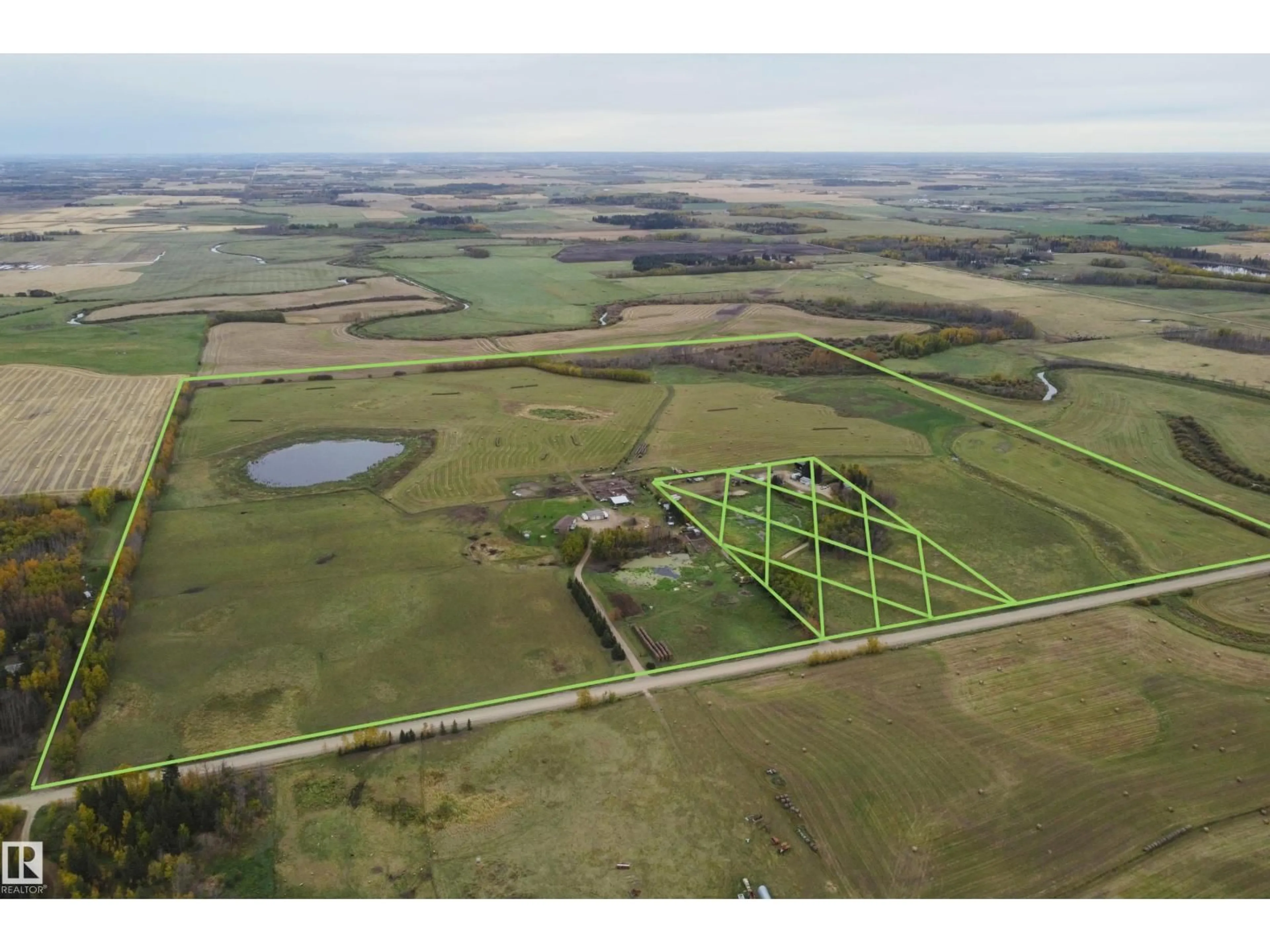 A pic from outside/outdoor area/front of a property/back of a property/a pic from drone, building for 59125 RGE RD 50, Rural Barrhead County Alberta T7N1N2