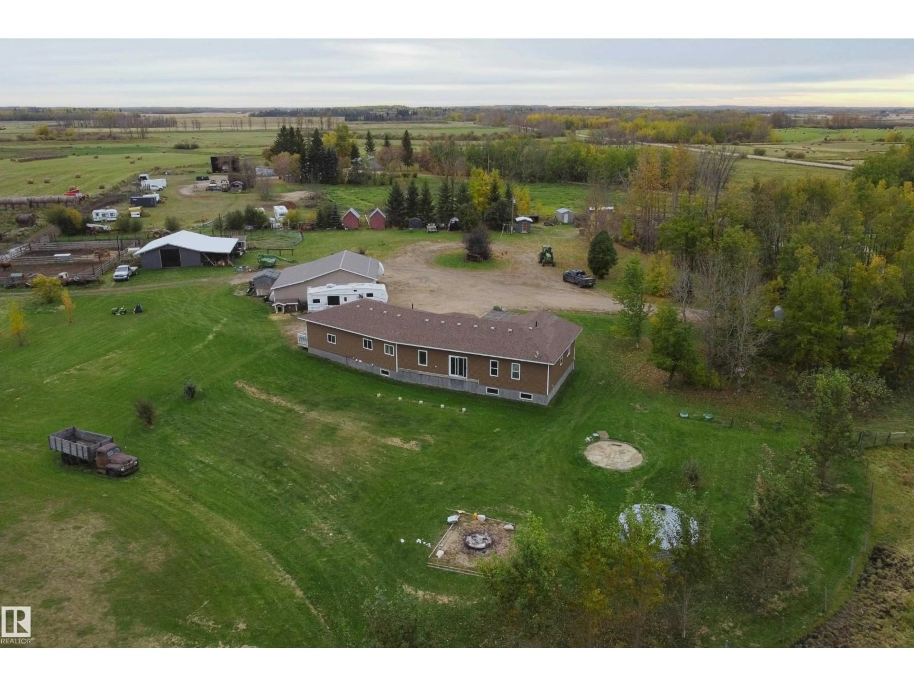 A pic from outside/outdoor area/front of a property/back of a property/a pic from drone, unknown for 59125 RGE RD 50, Rural Barrhead County Alberta T7N1N2