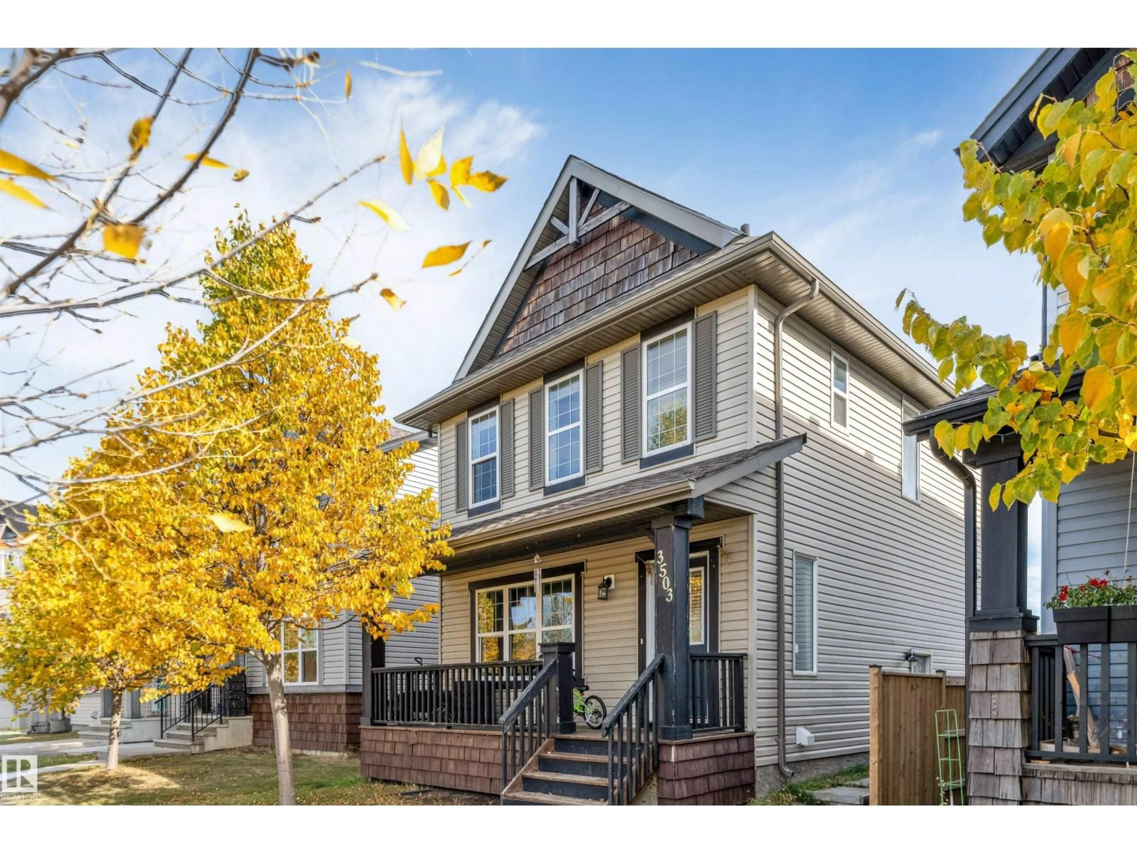 Home with vinyl exterior material, street for NW - 3503 15A ST, Edmonton Alberta T6T0M9