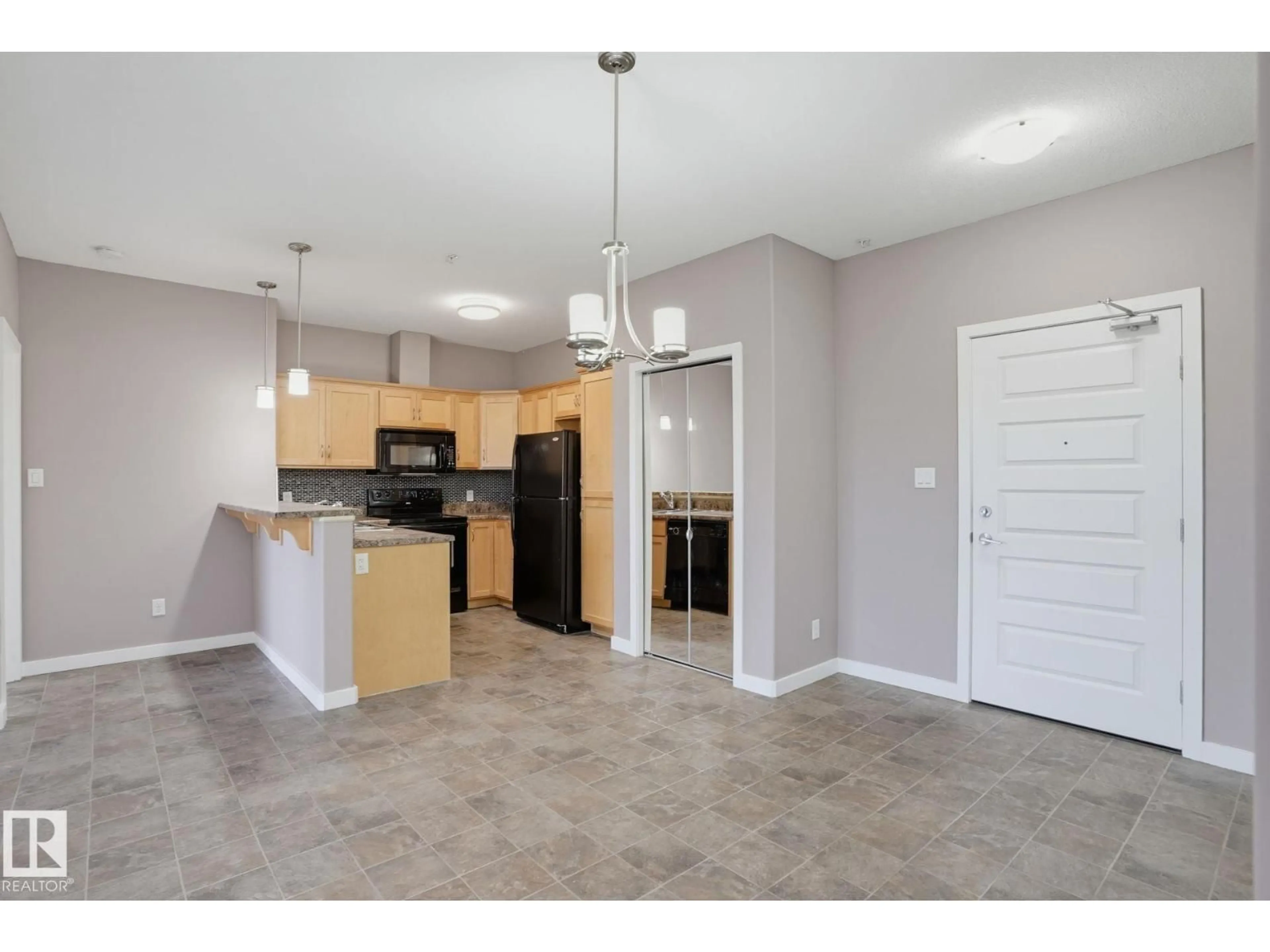 Open concept kitchen, unknown for 310 - 304 AMBLESIDE LI, Edmonton Alberta T6W0V2