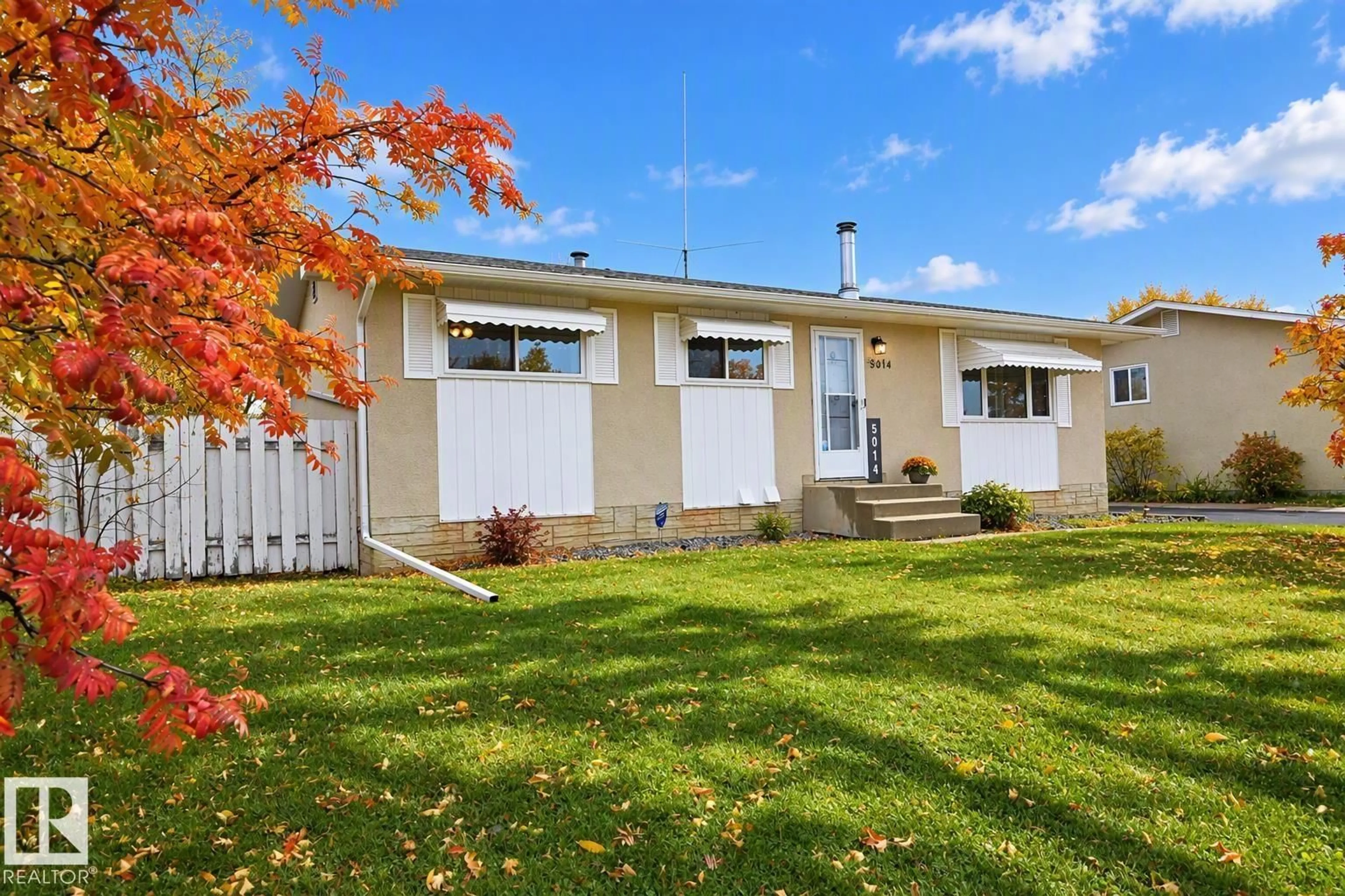 Home with vinyl exterior material, street for 5014 54 AV, Leduc Alberta T9E5L5