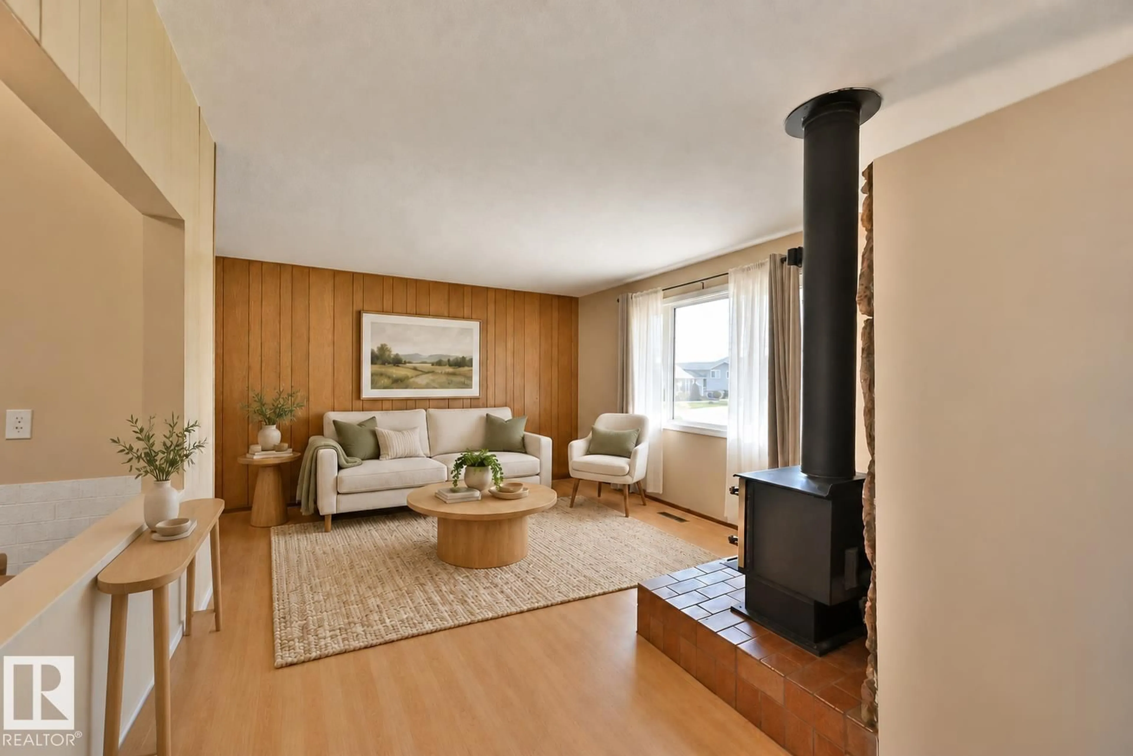 Living room with furniture, wood/laminate floor for 5014 54 AV, Leduc Alberta T9E5L5