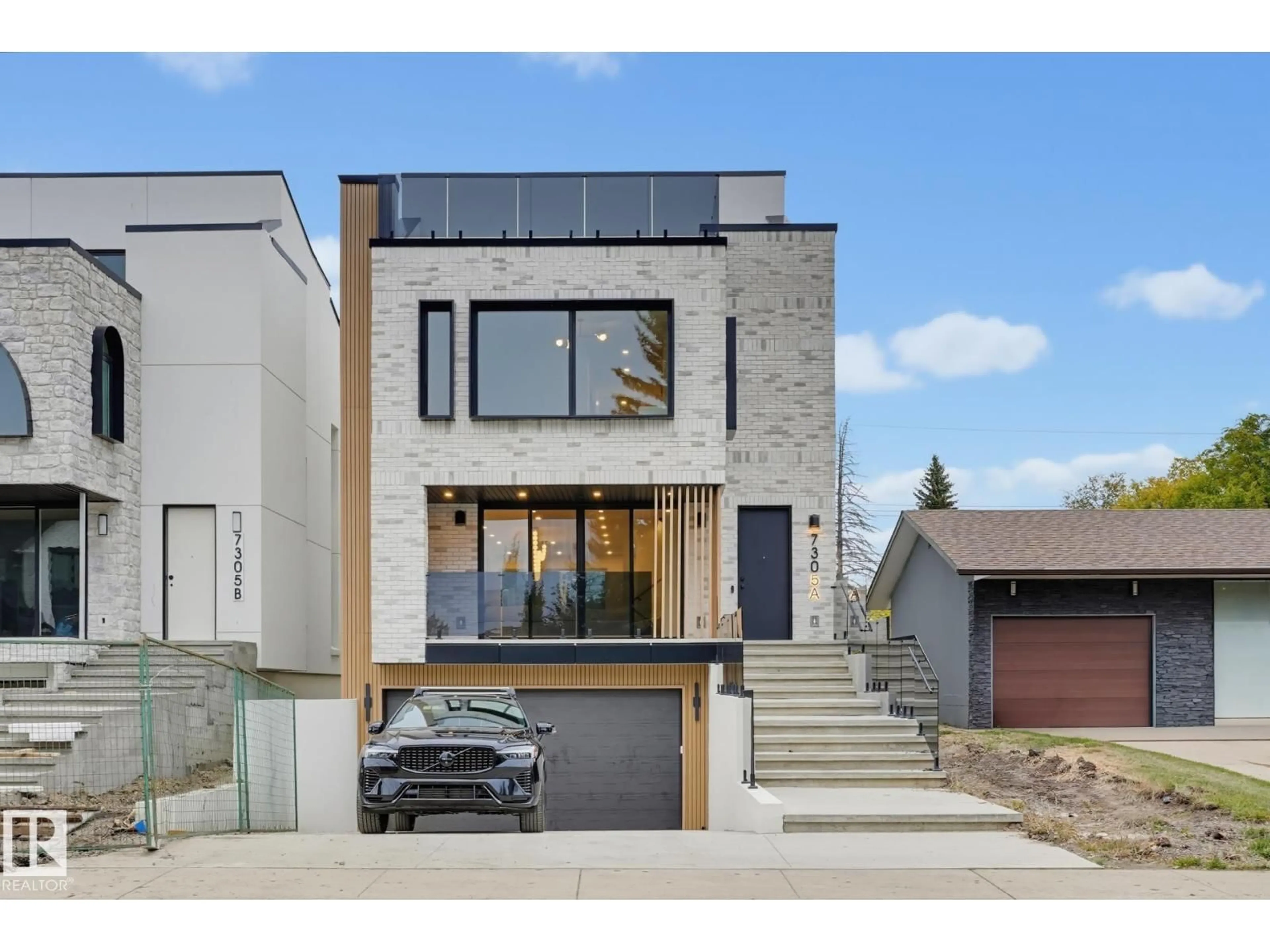 Home with brick exterior material, street for A - 7305 155 ST, Edmonton Alberta T5R1V4