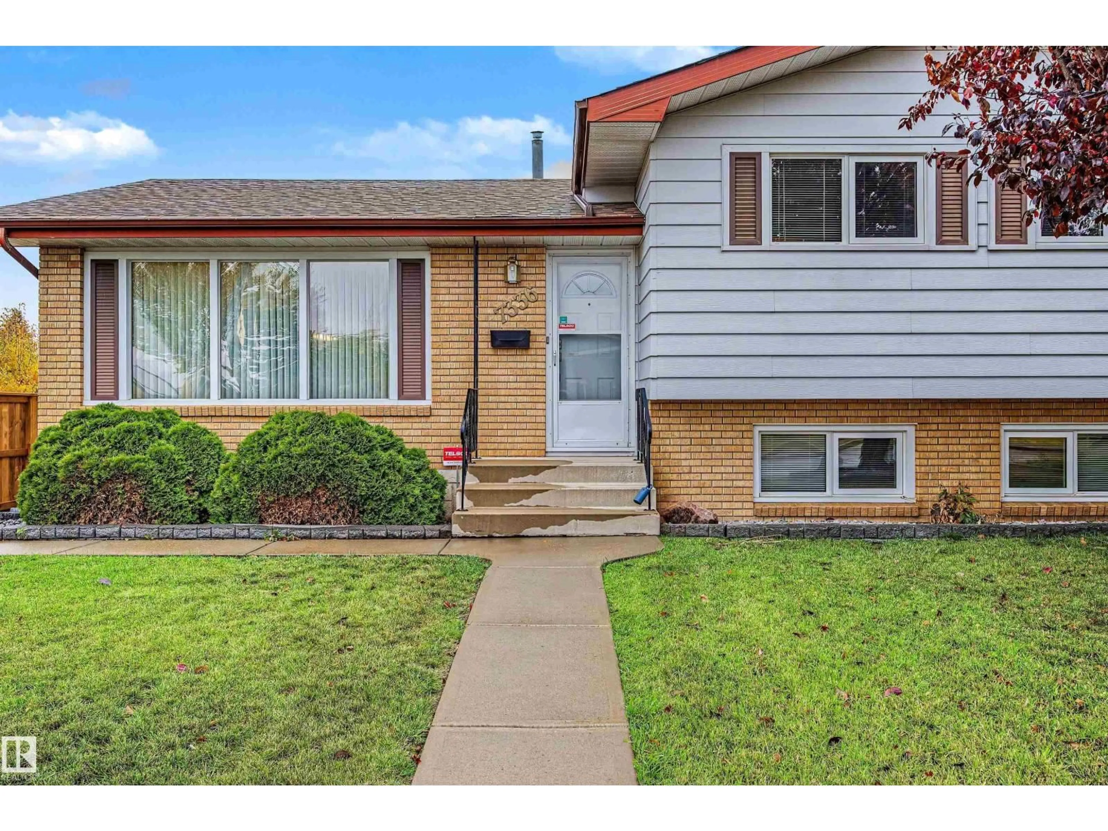 Home with vinyl exterior material, street for 7336 147 AV, Edmonton Alberta T5C2T2