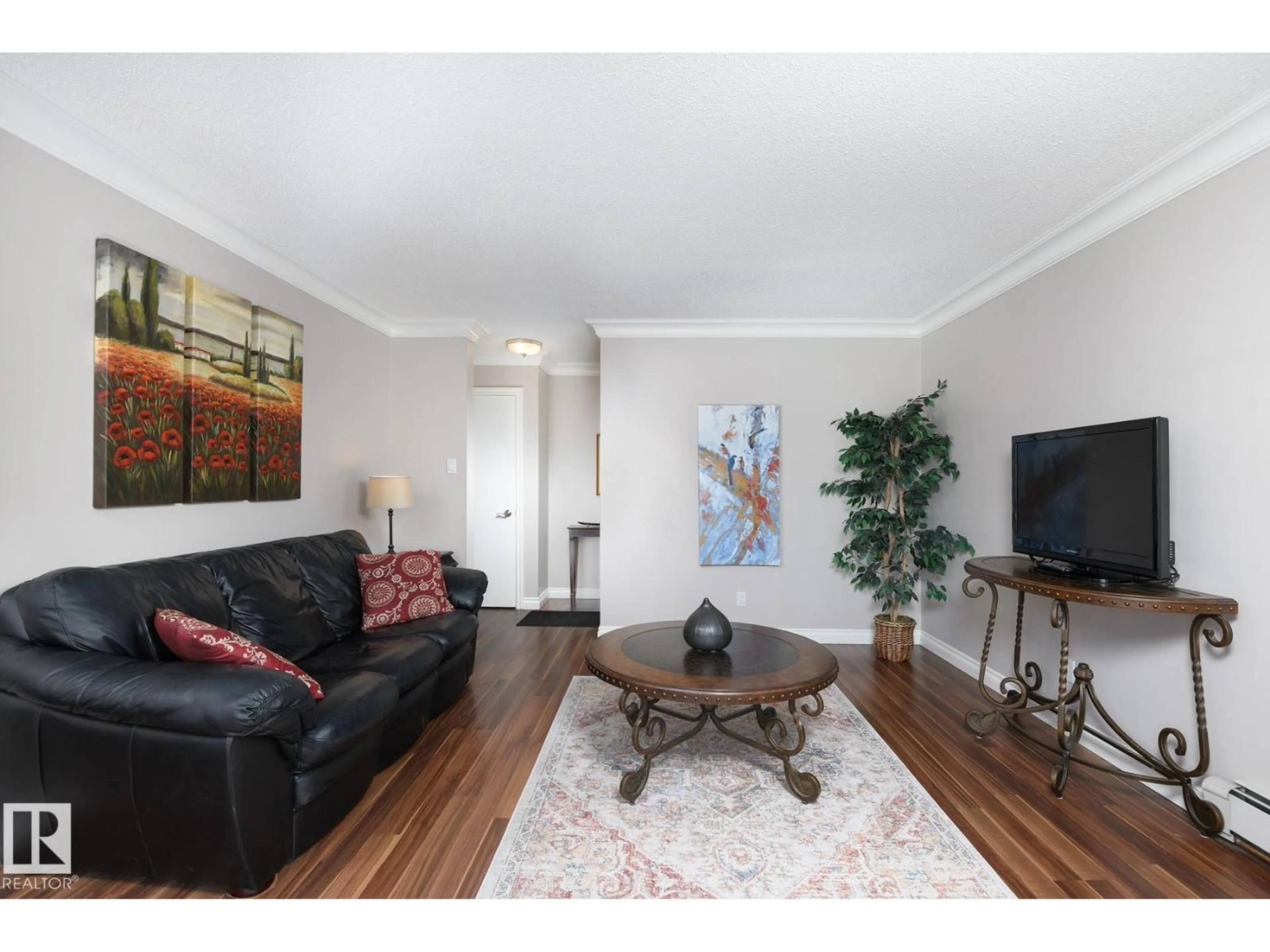 Living room with furniture, wood/laminate floor for #308 - 10735 81 AV, Edmonton Alberta T6E1Y2